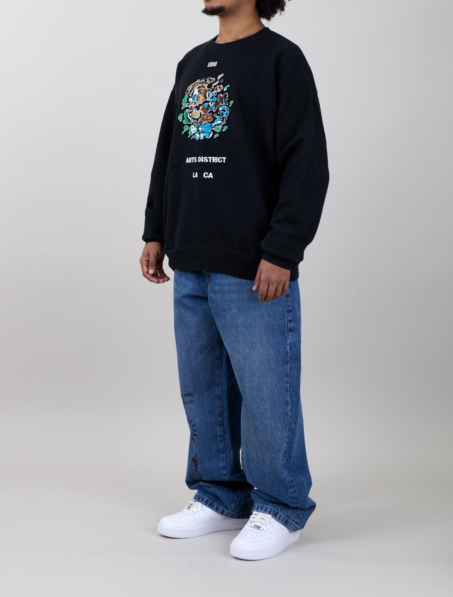 Embrace The Elements Crewneck on male model - Left View