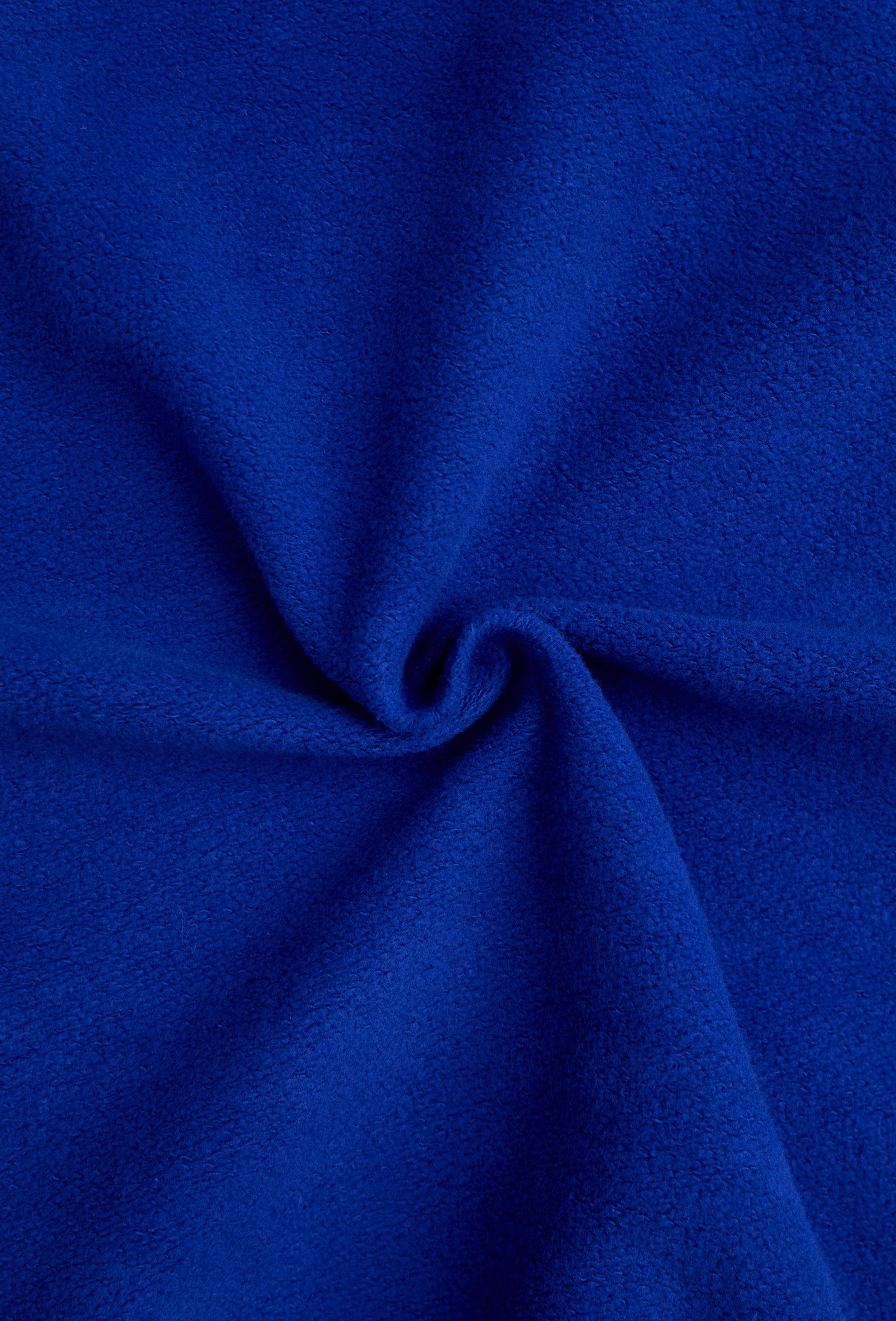 Blue fleece fabric with spiral pattern.