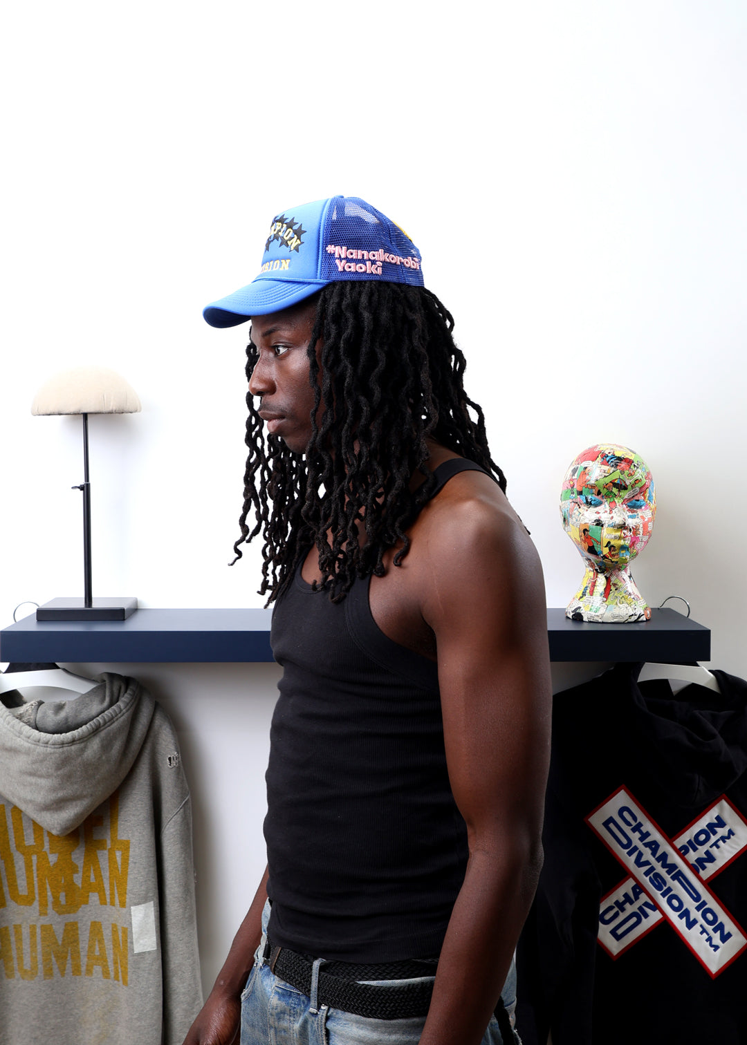 Fall 7 Rise 8 Blue Trucker Hat worn by male model -Side View