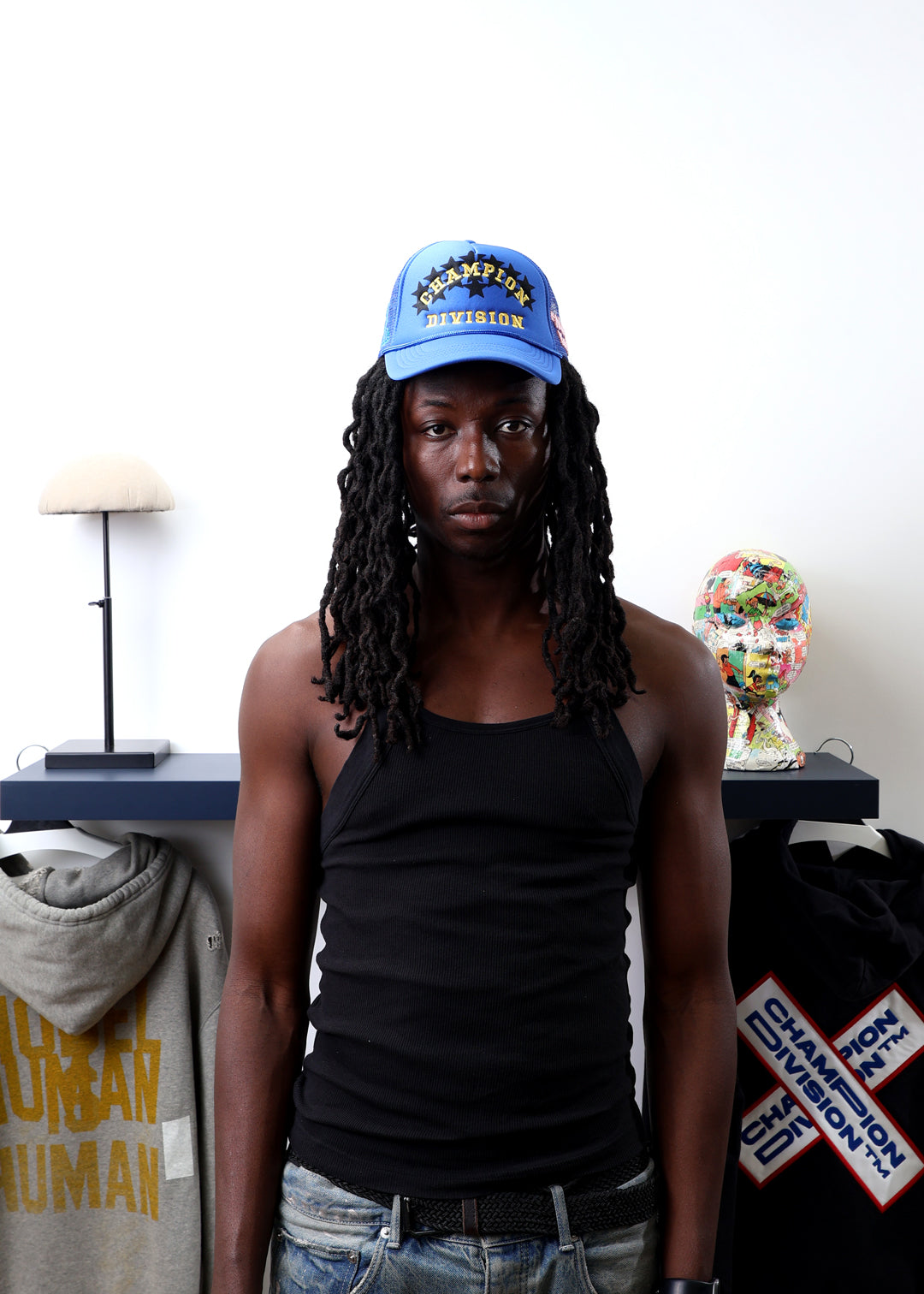 Fall 7 Rise 8 Blue Trucker Hat worn by male model -Front View