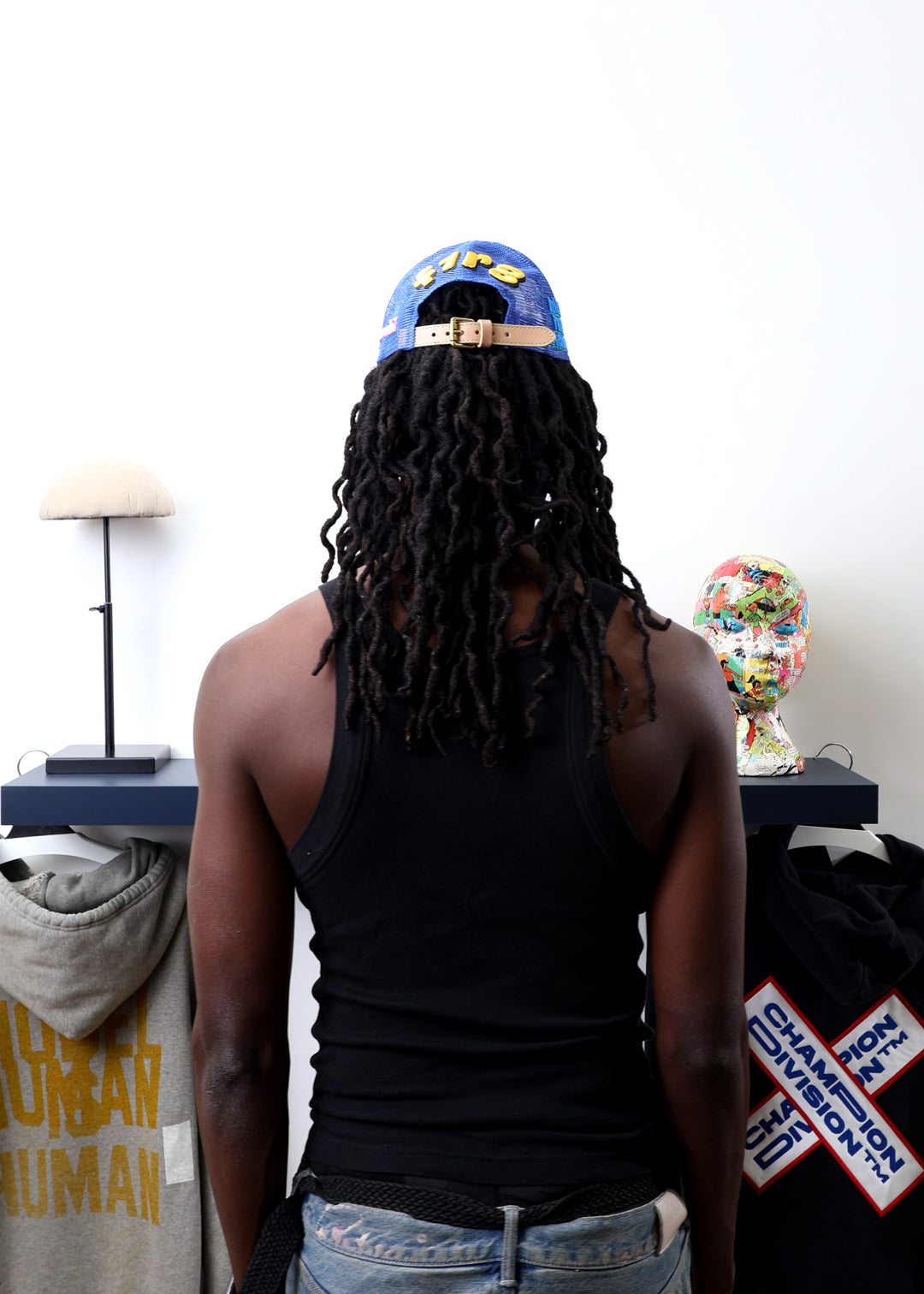 Fall 7 Rise 8 Blue Trucker Hat worn by male model -Back View