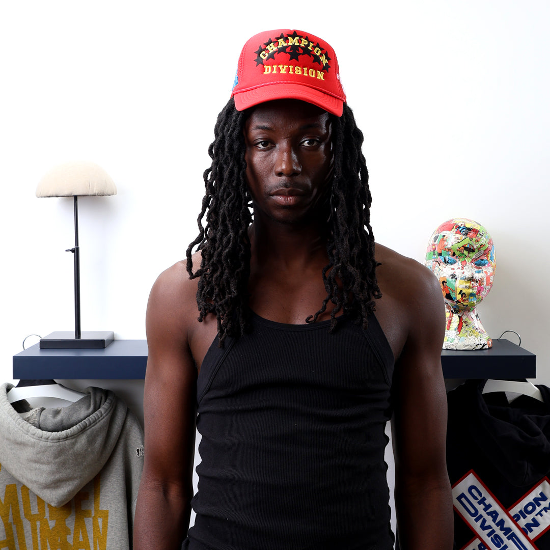 Fall 7 Rise 8 Red Trucker Hat worn by male model -Front View