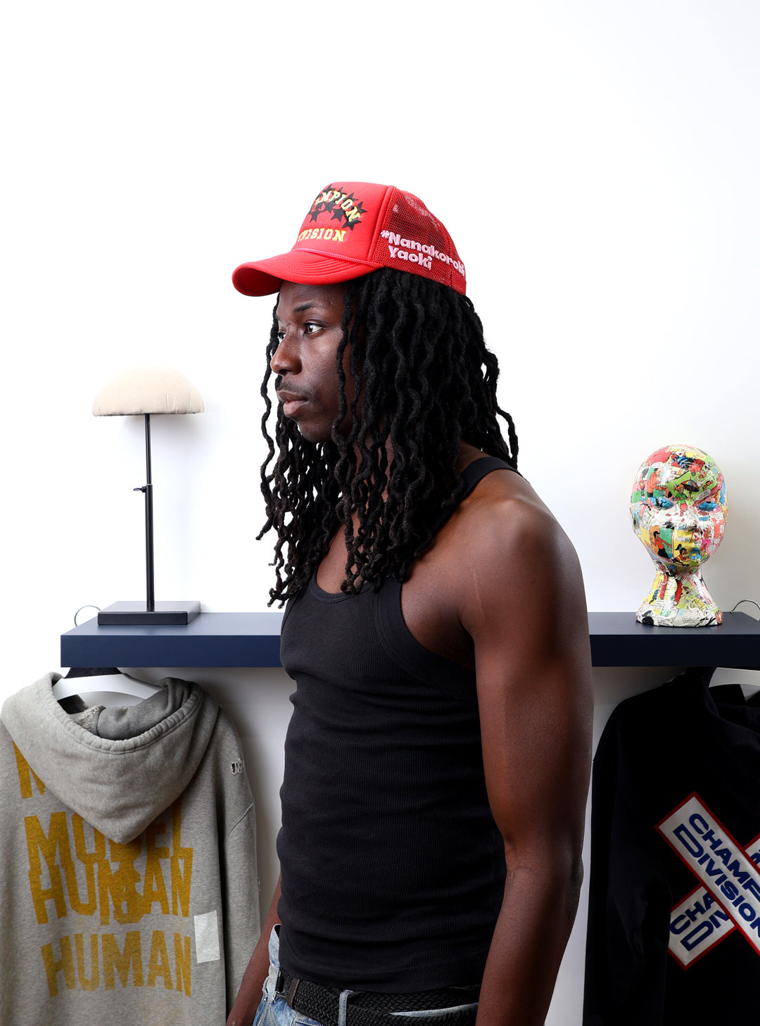 Fall 7 Rise 8 Red Trucker Hat worn by male model -Left View