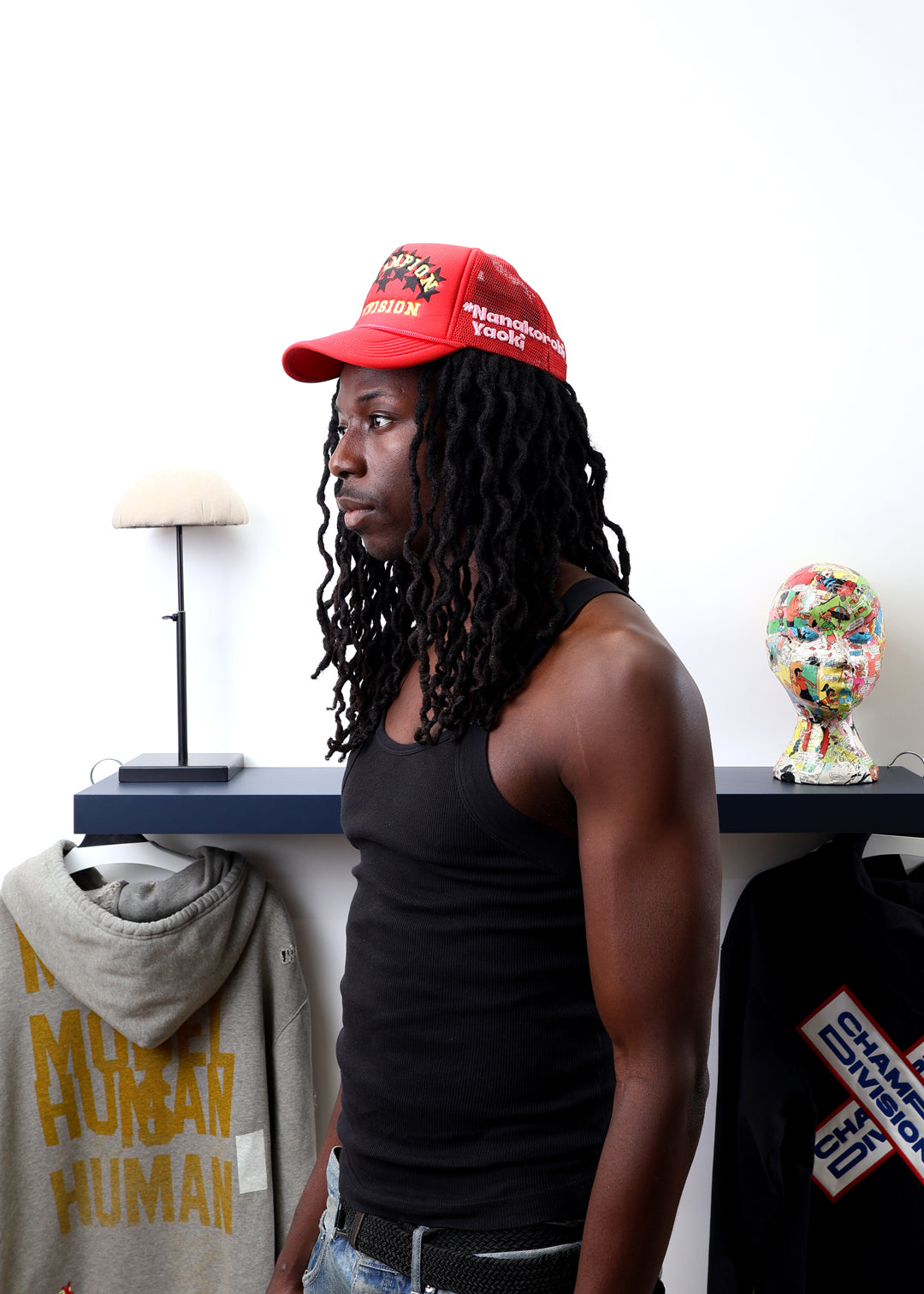 Fall 7 Rise 8 Red Trucker Hat worn by male model -Left View