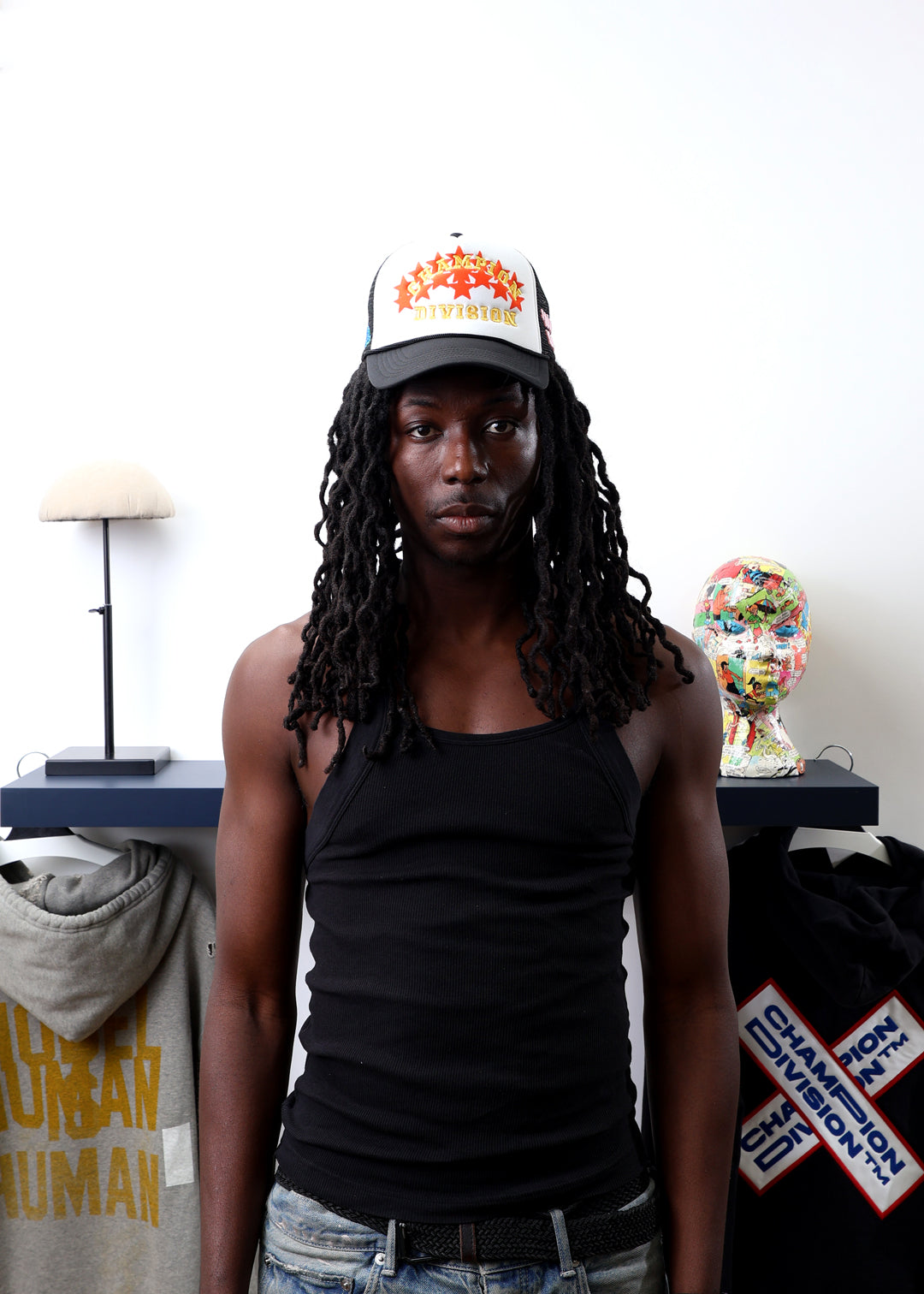 Fall 7 Rise 8 Black/White Trucker Hat worn by male model -Front View