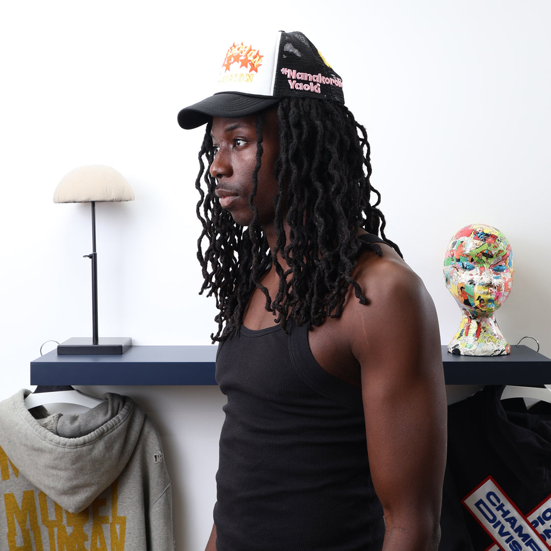 Fall 7 Rise 8 Black/White Trucker Hat worn by male model -Side View