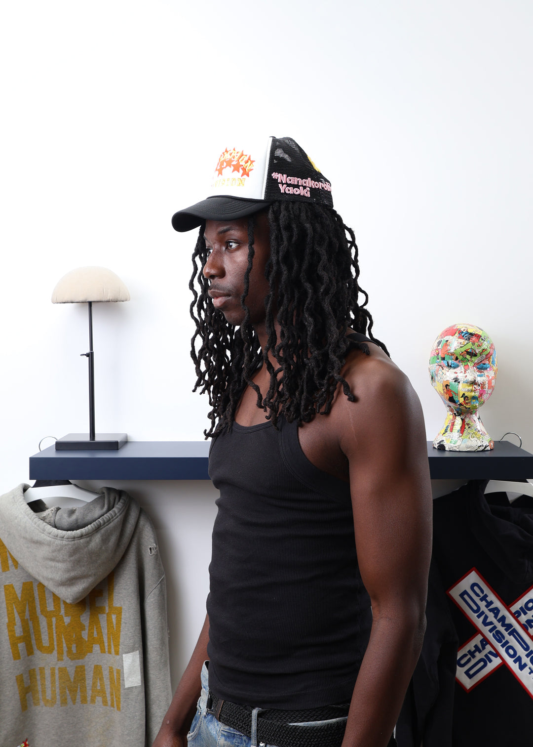 Fall 7 Rise 8 Black/White Trucker Hat worn by male model -Side View