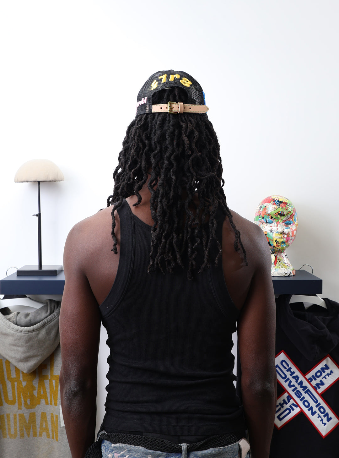 Fall 7 Rise 8 Black/White Trucker Hat worn by male model -Back View
