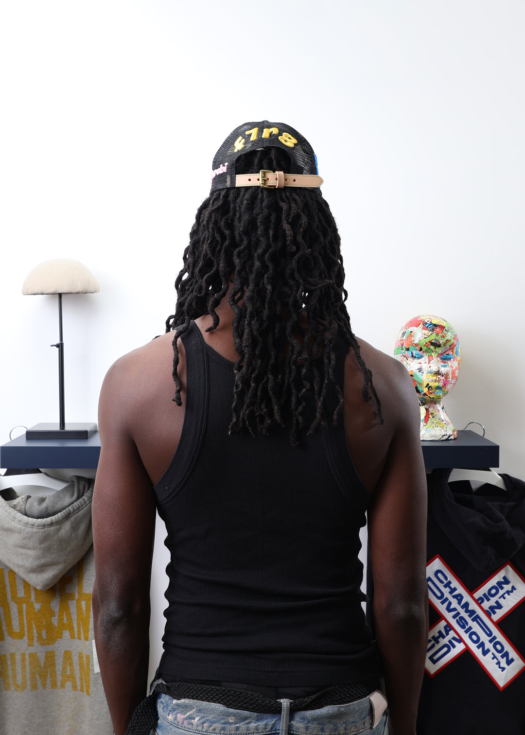 Fall 7 Rise 8 Black/White Trucker Hat worn by male model -Back View