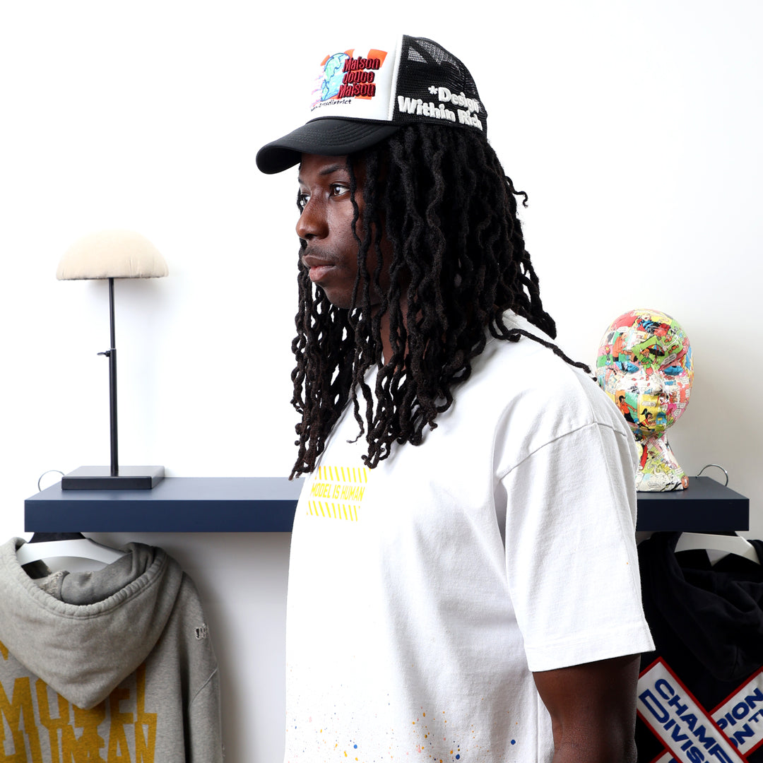 Home Sweet Home Black/White Trucker Hat worn by male model -Side View