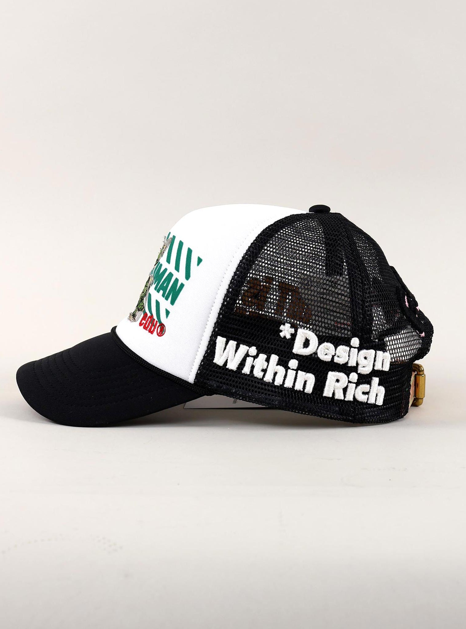 Black and white mesh cap with "Design Within Rich."