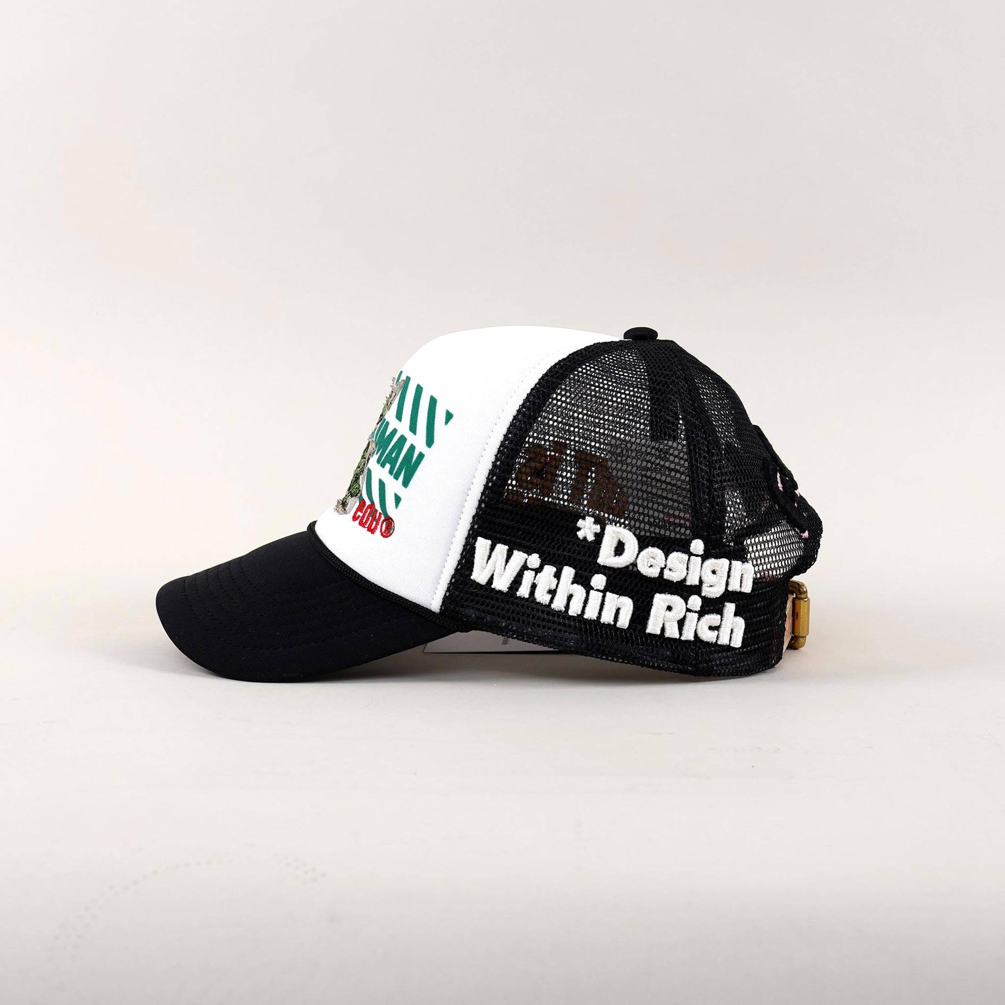 Black and white mesh cap with "Design Within Rich."
