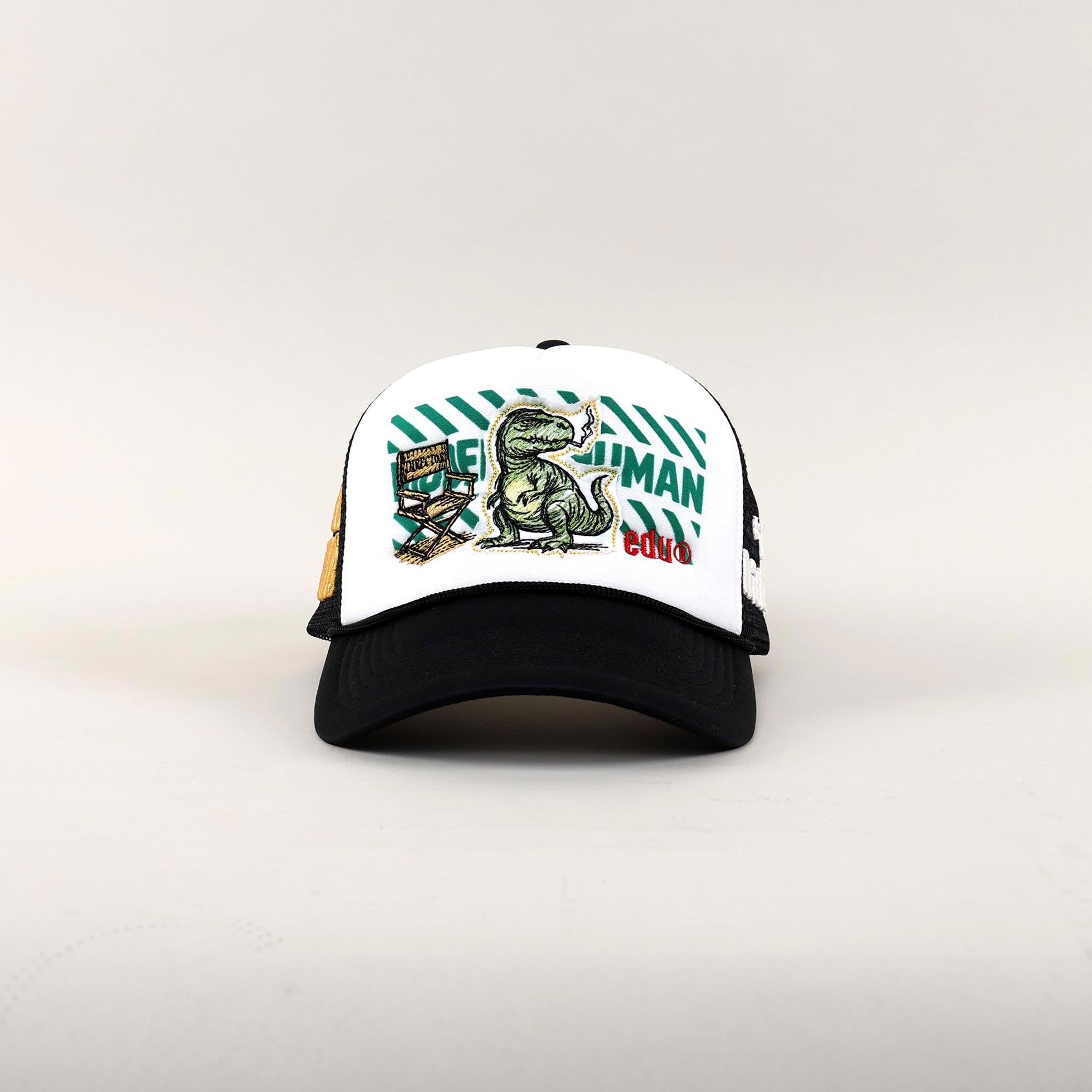 Baseball cap with dinosaur and chair design.