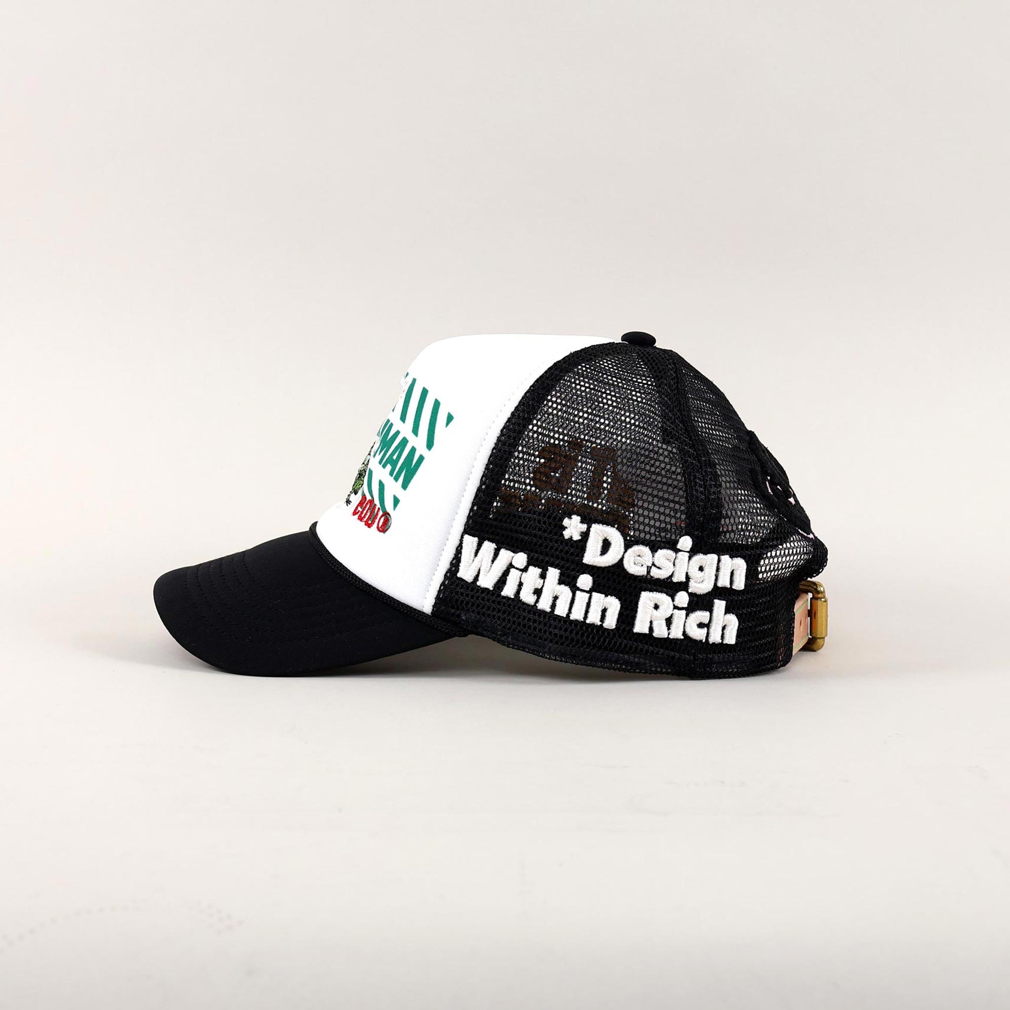 Black and white trucker hat with text on side.