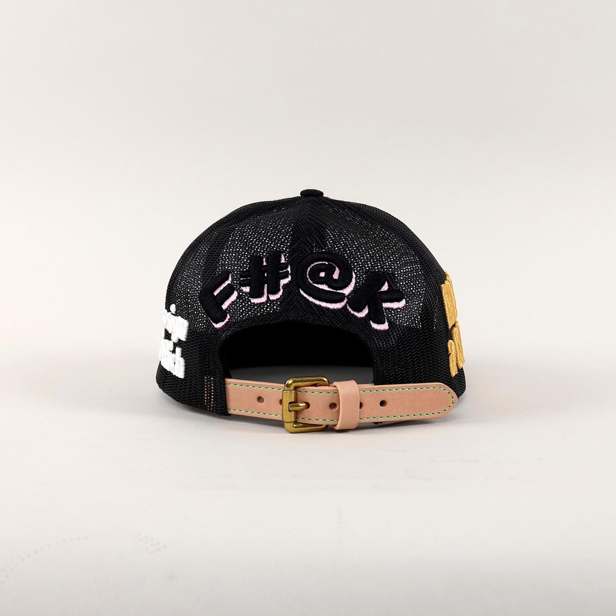 Back view of black mesh cap with embroidered text.