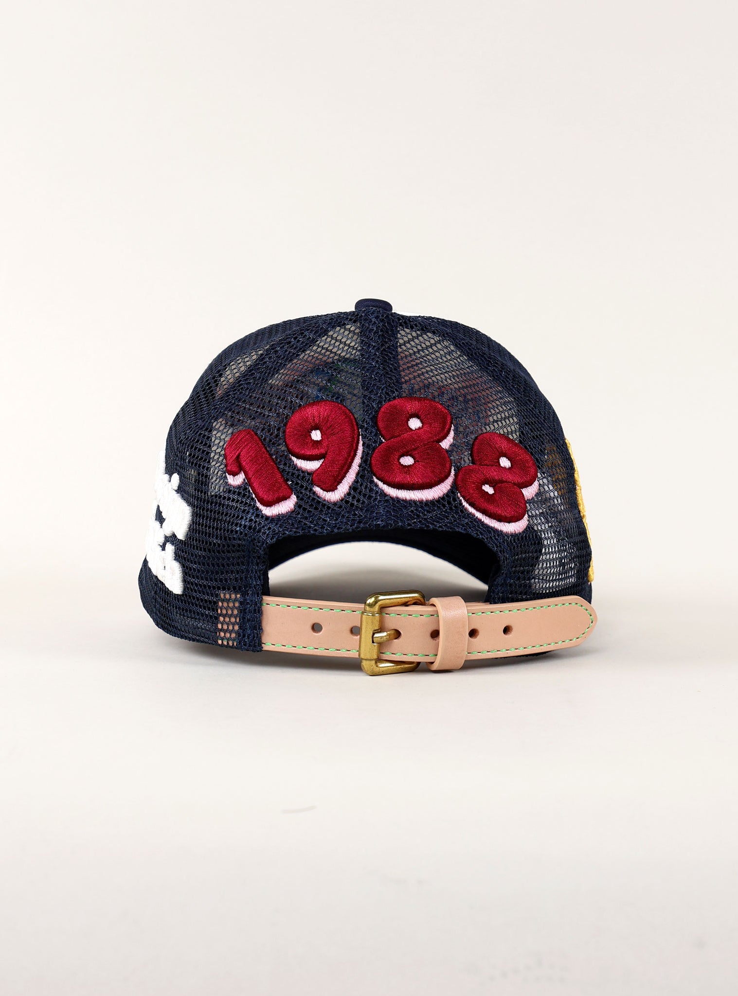 Back of a cap with "1988" embroidery.