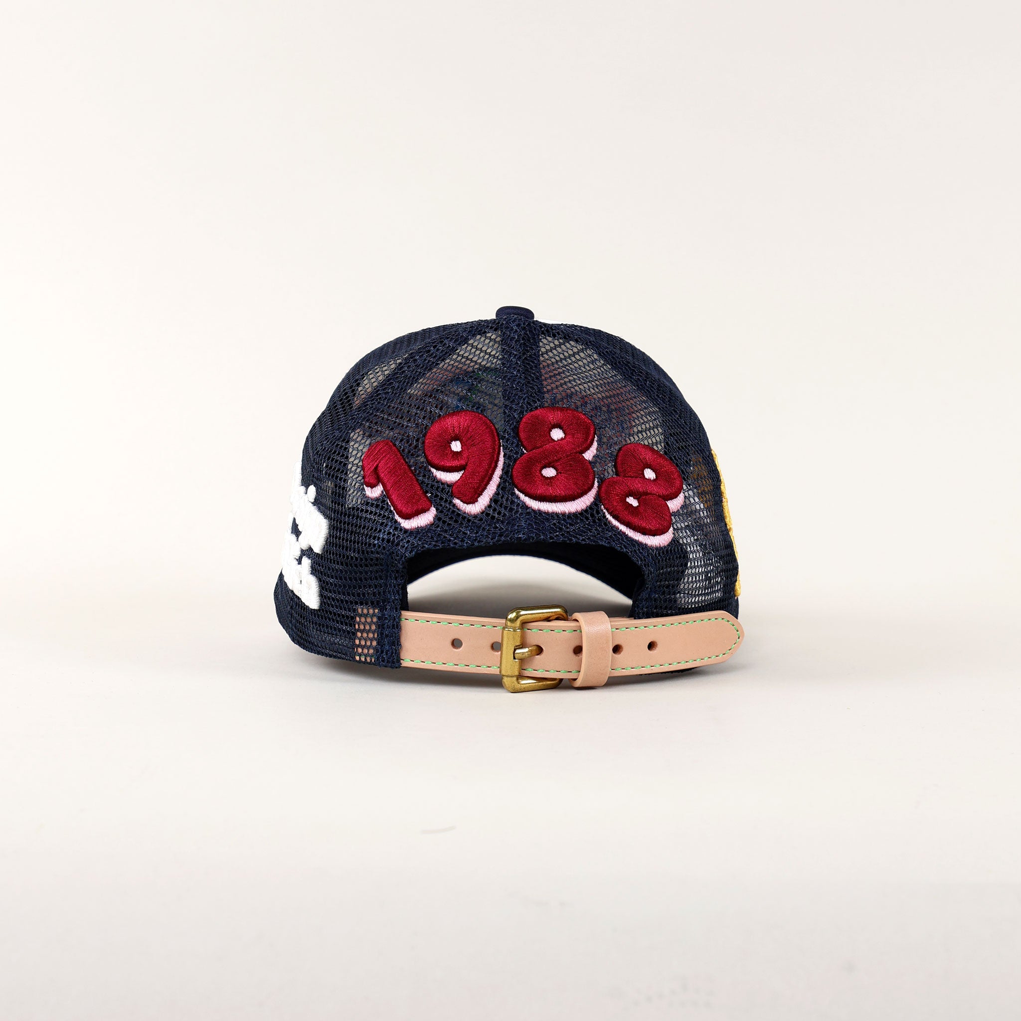 Back of a cap with "1988" embroidery.