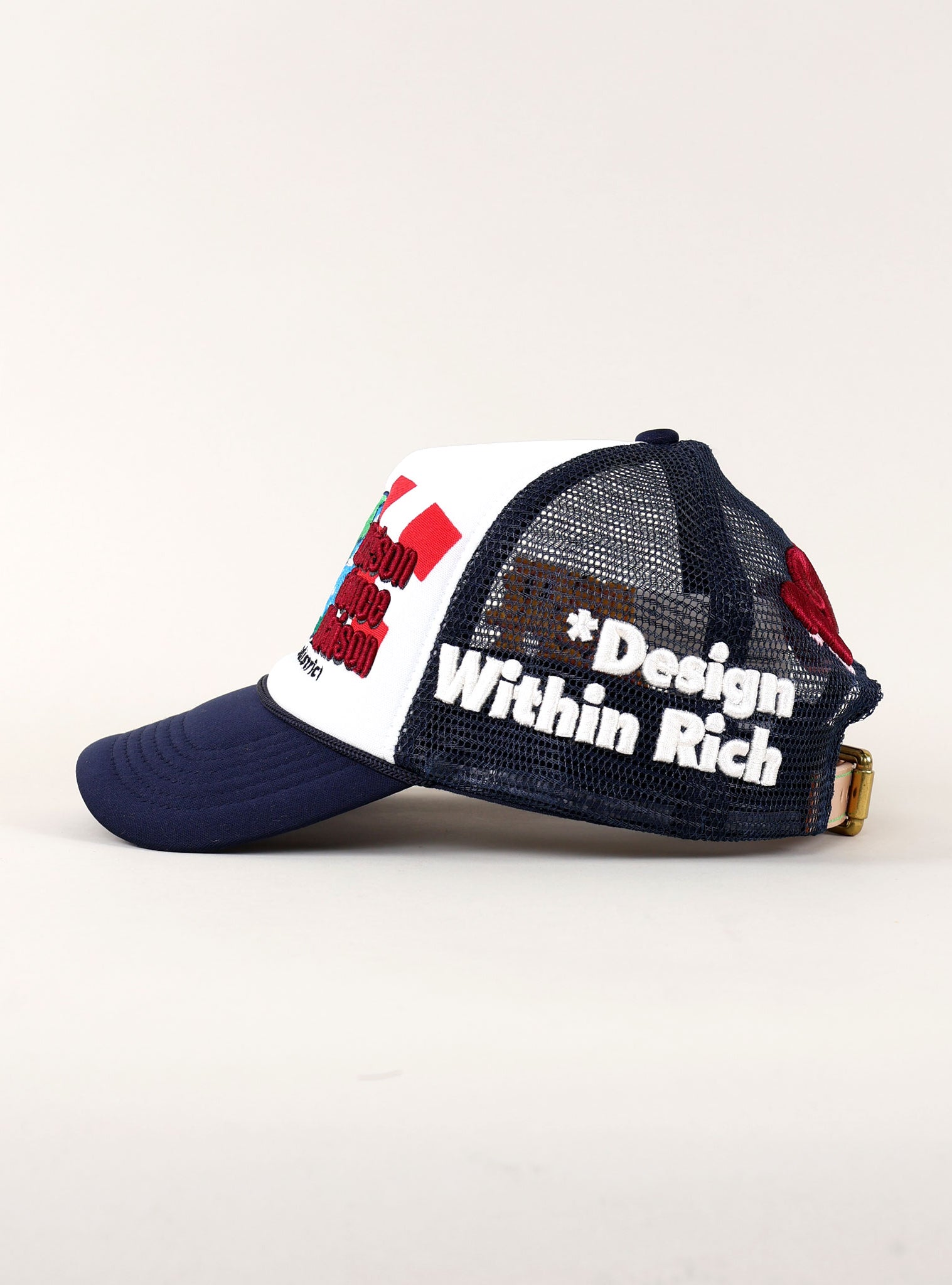 Blue and white mesh cap with text design.