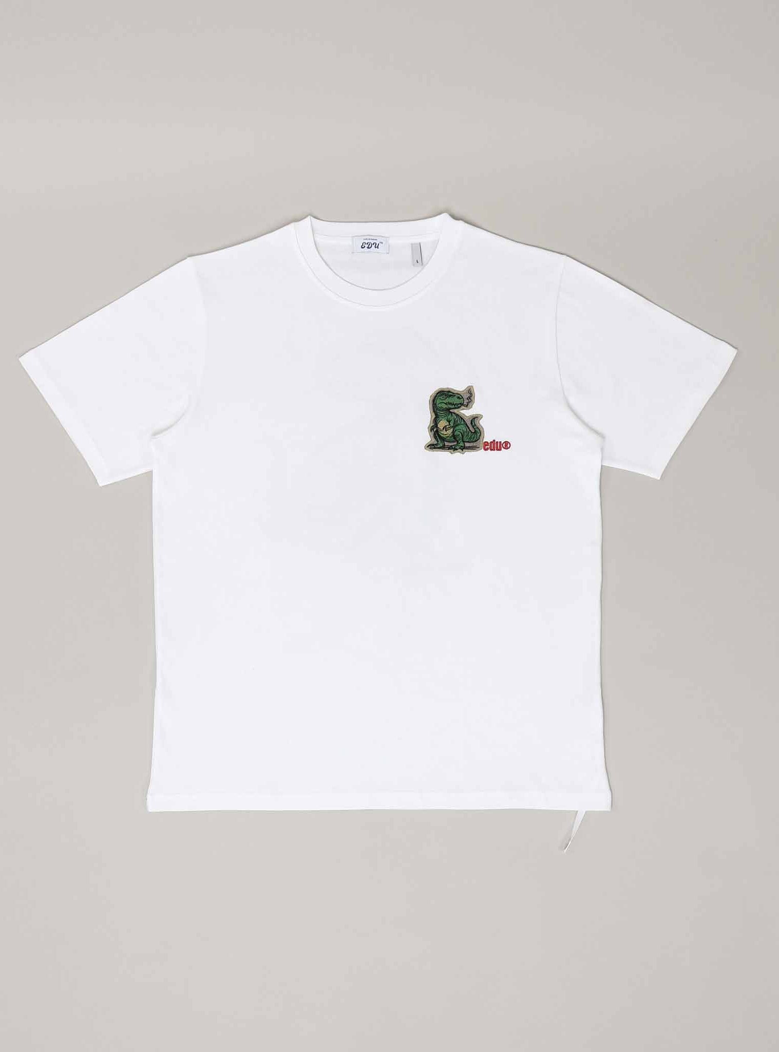 White T-shirt with green dinosaur graphic.