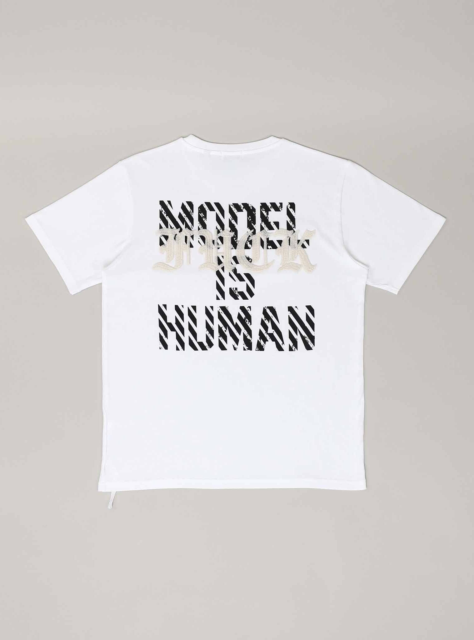 Model is Human tee with artistic design