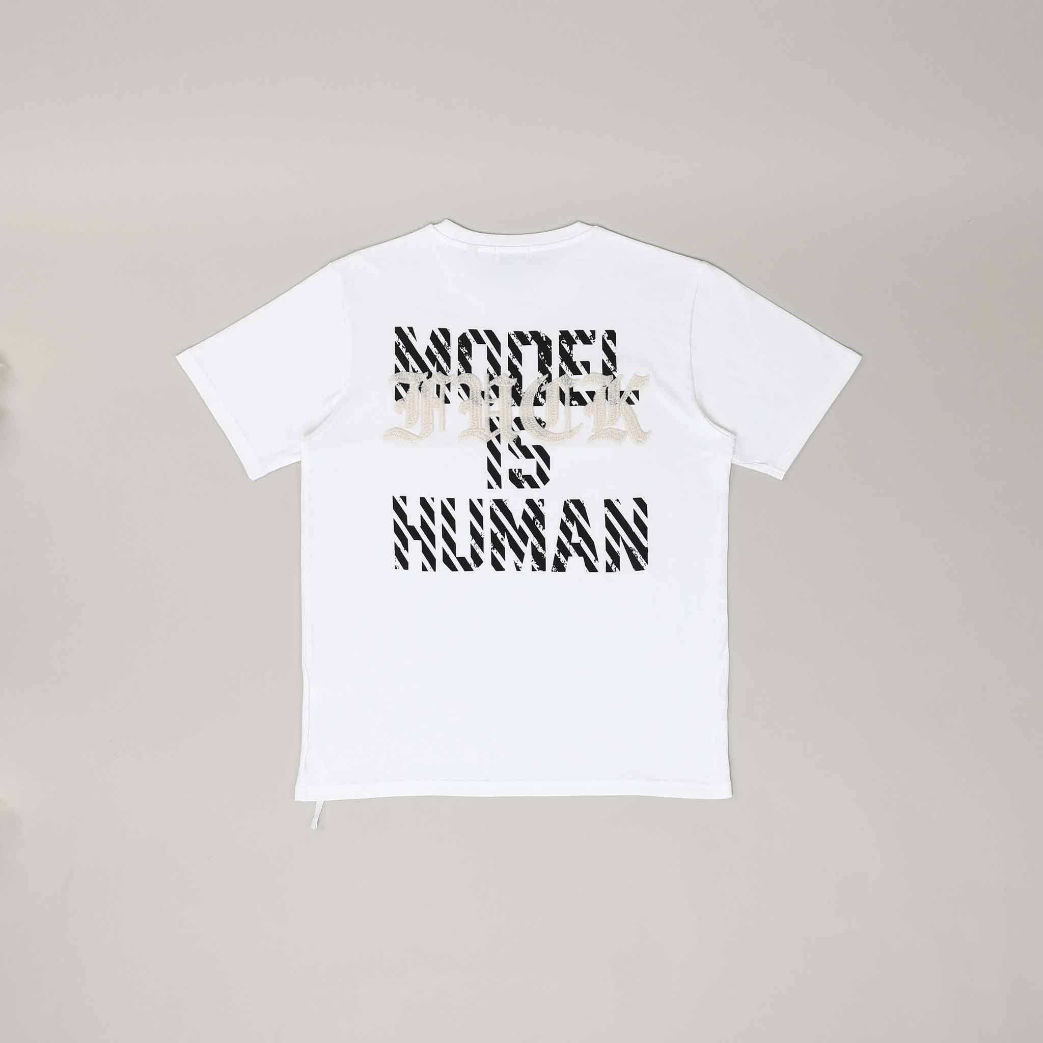 Model is Human tee with artistic design