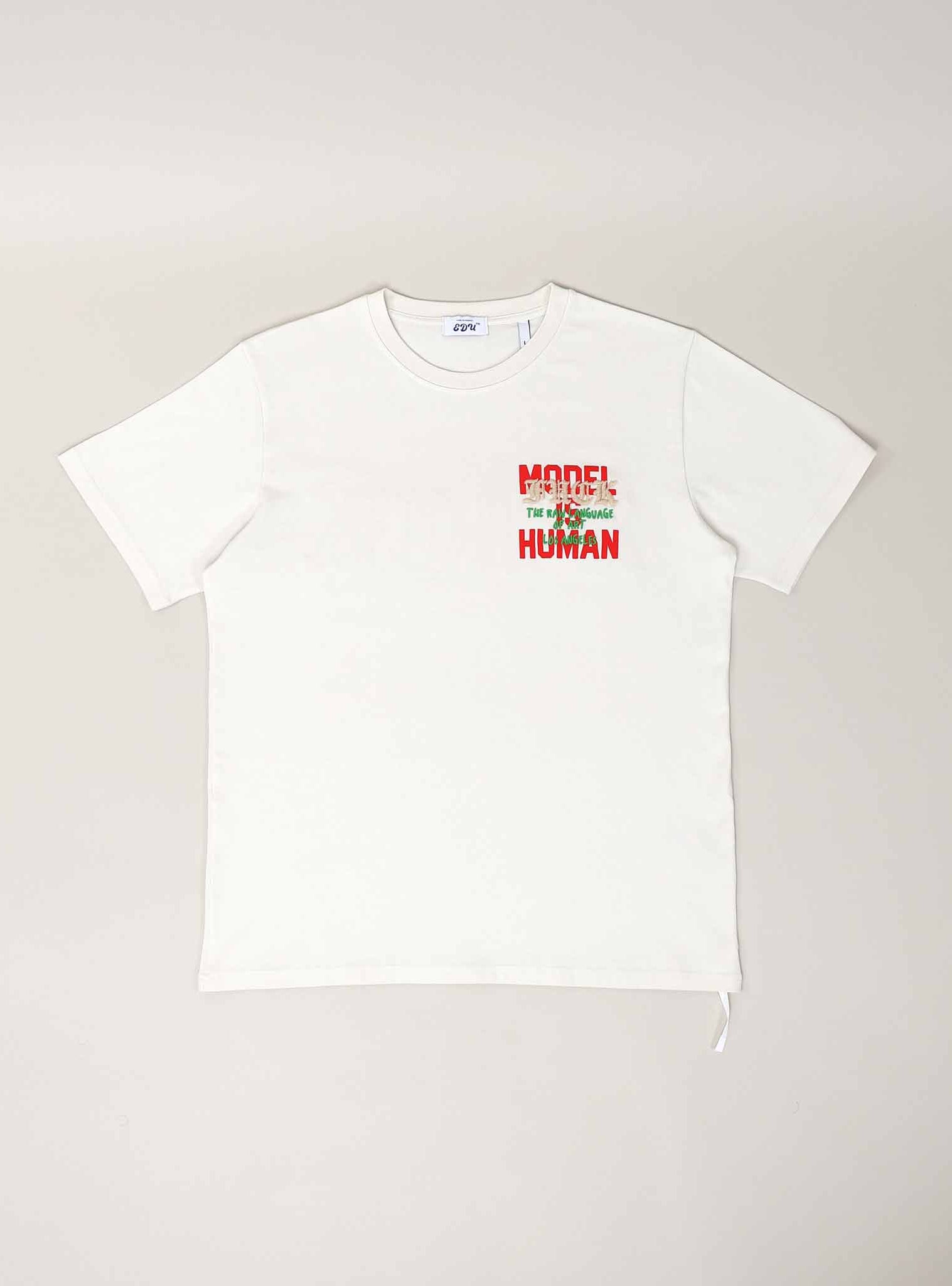 White T-shirt with red and green text.