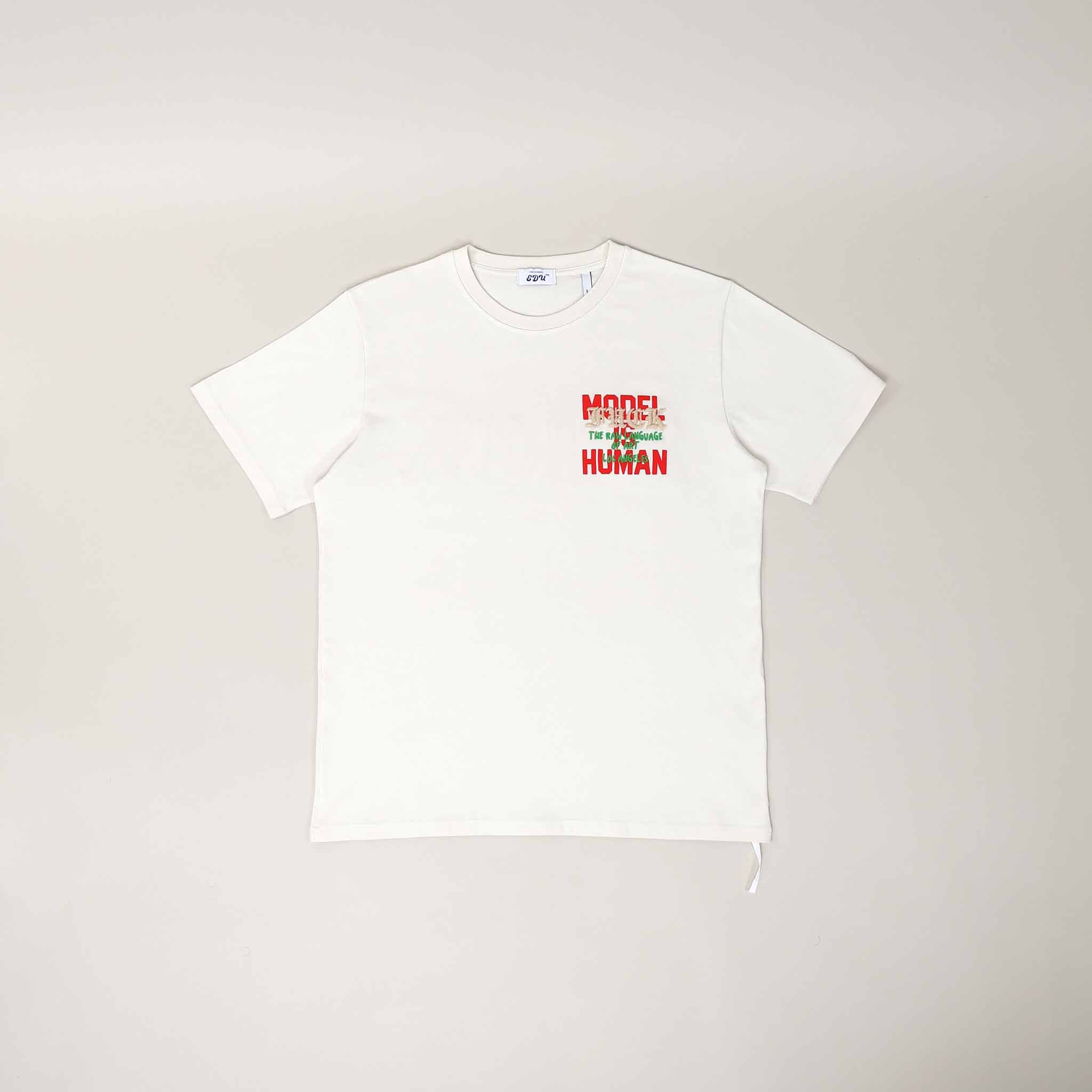 White T-shirt with red and green text.