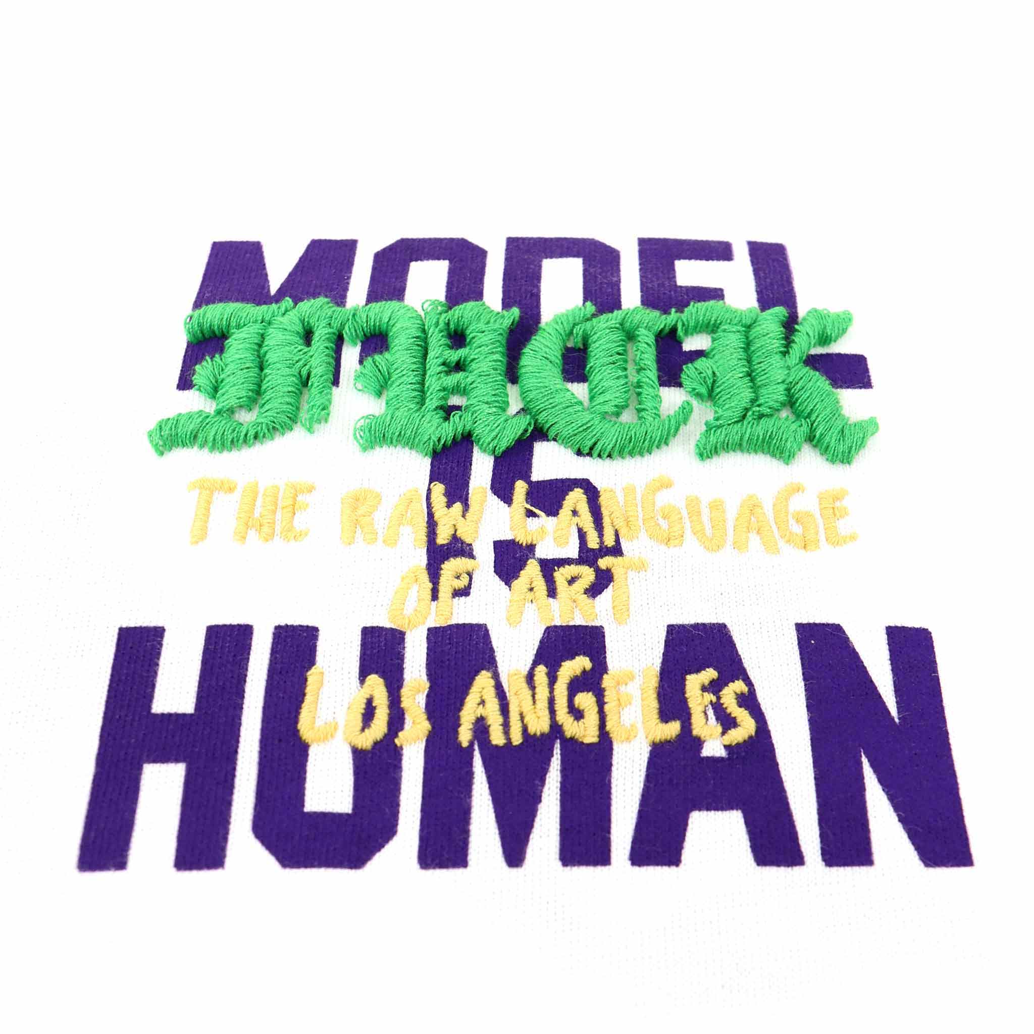 Text embroidery: "The Raw Language of Art Los Angeles".