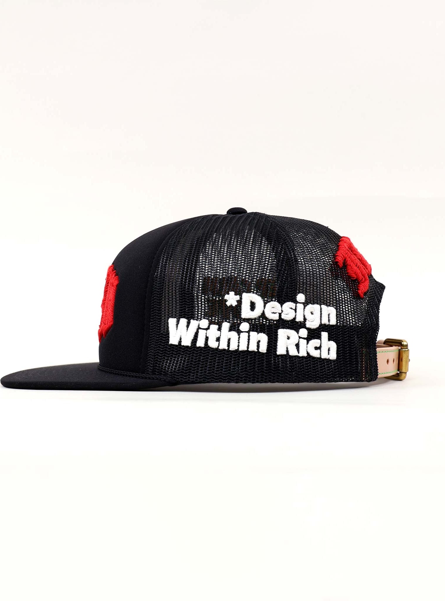 Black mesh cap with "Design Within Rich" text.