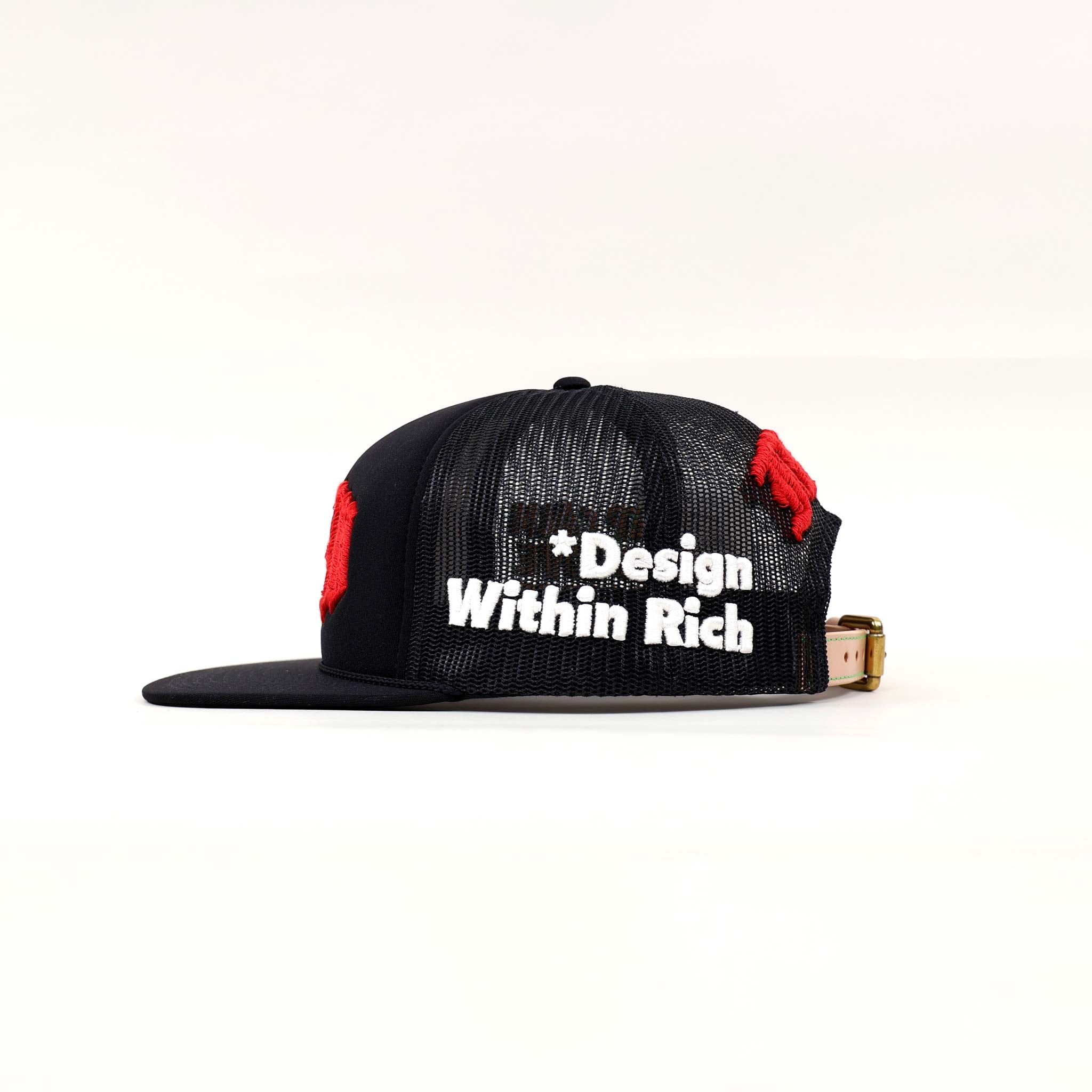 Black mesh cap with "Design Within Rich" text.