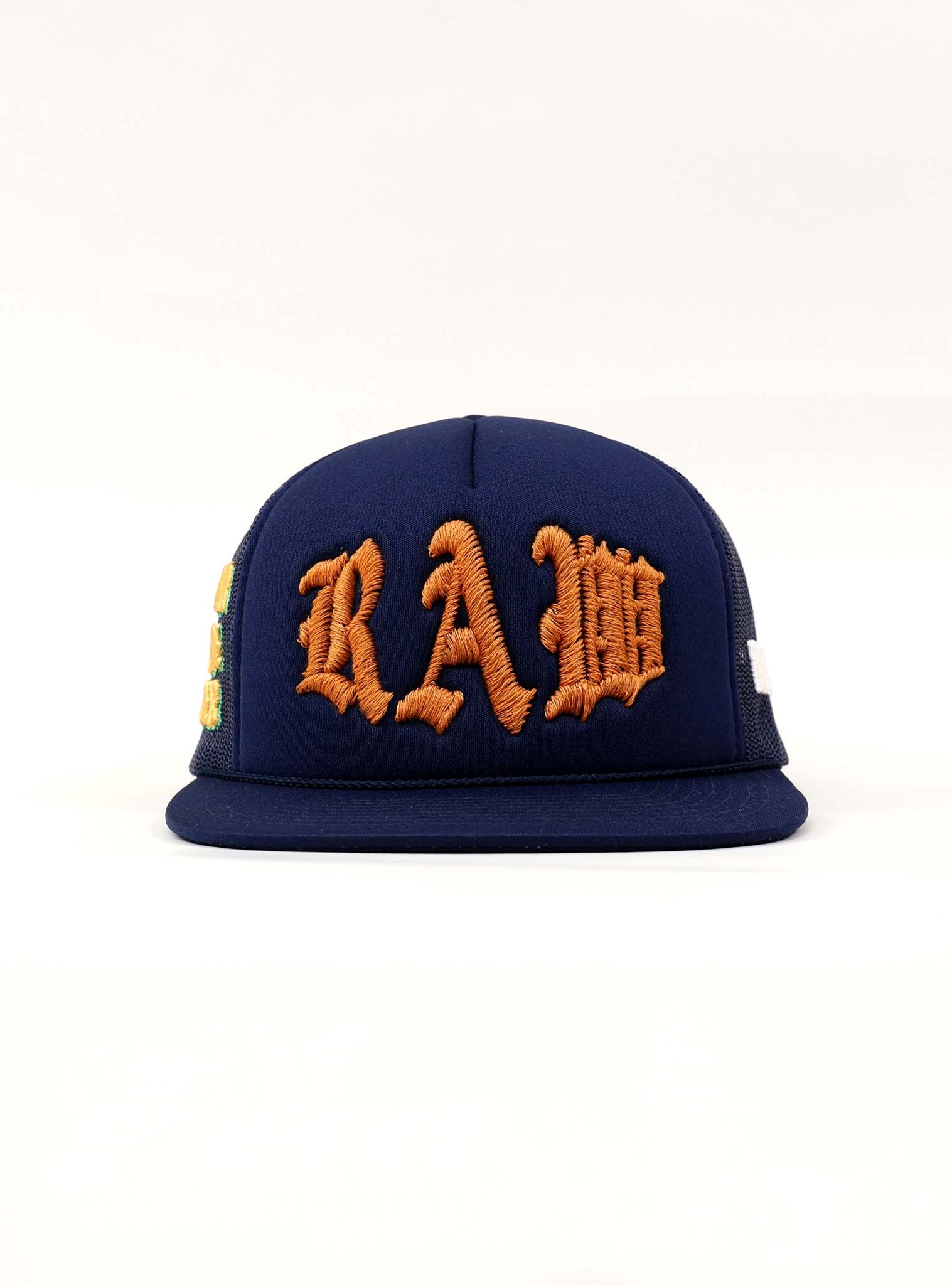Blue cap with "RAW" in orange embroidery.