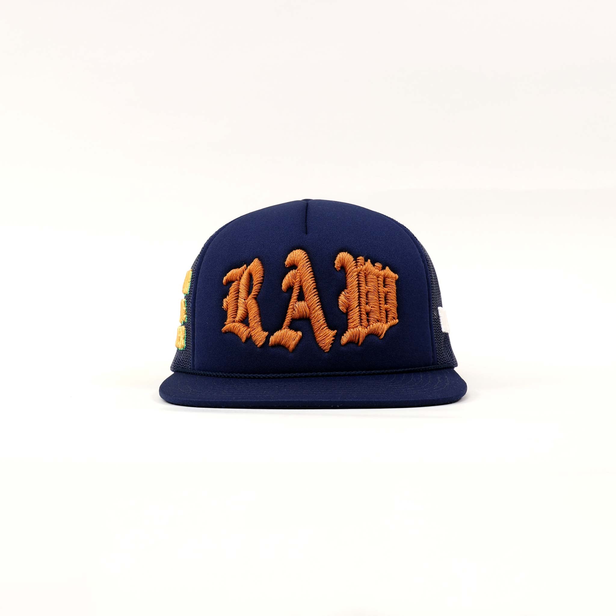 Blue cap with "RAW" in orange embroidery.