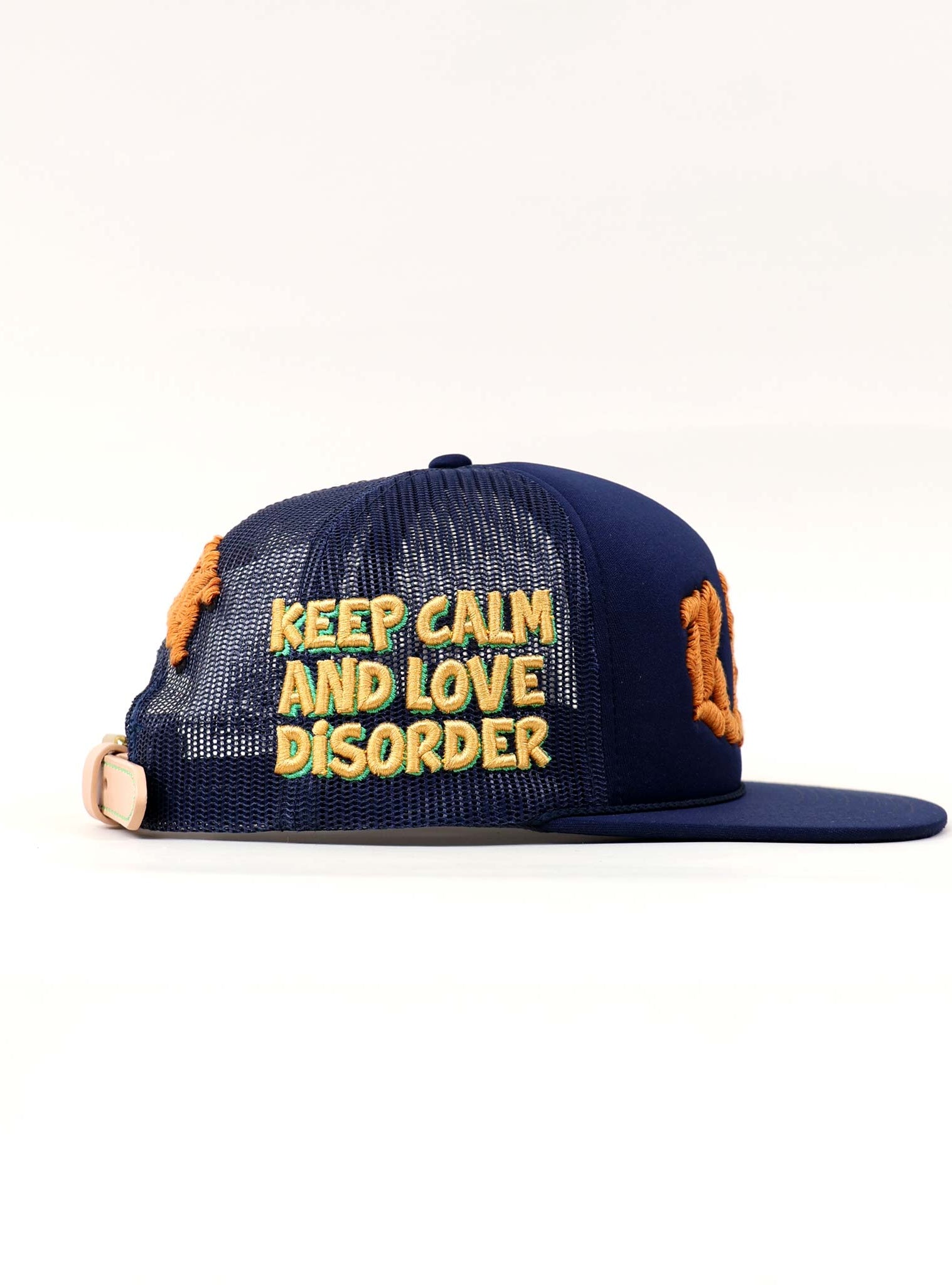 Blue cap with "Keep Calm and Love Disorder" text.