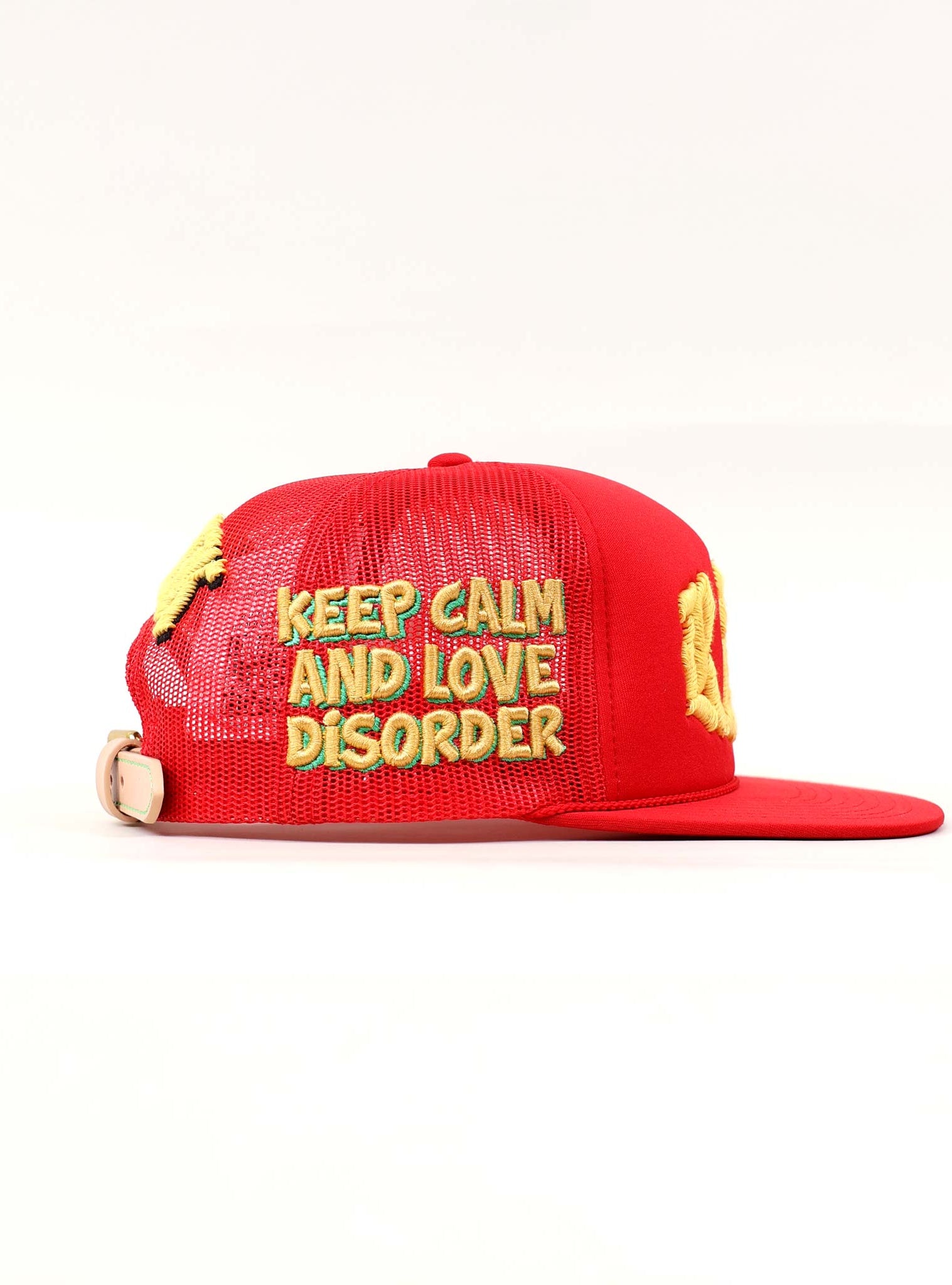 Red cap with "Keep Calm and Love Disorder" text.