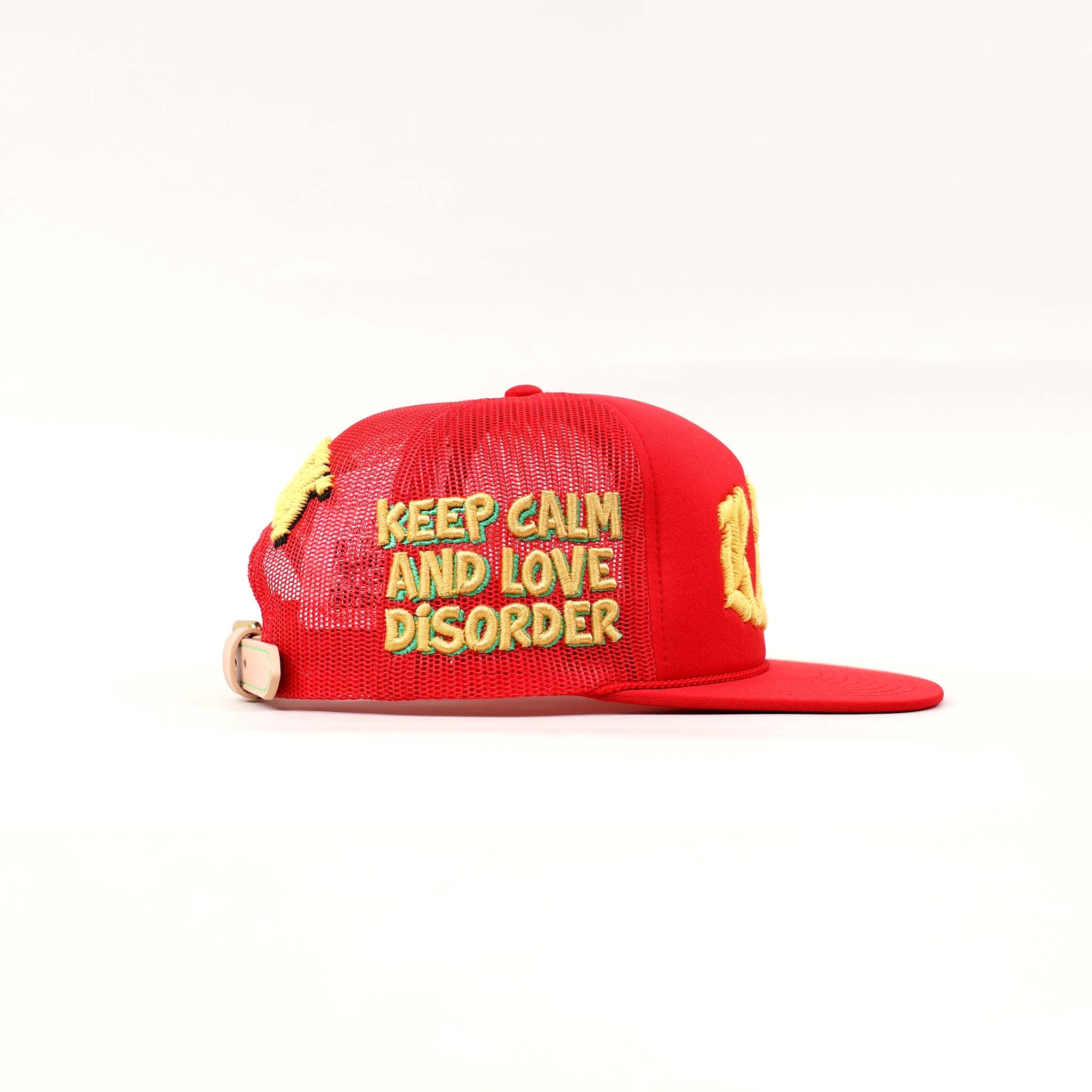 Red cap with "Keep Calm and Love Disorder" text.