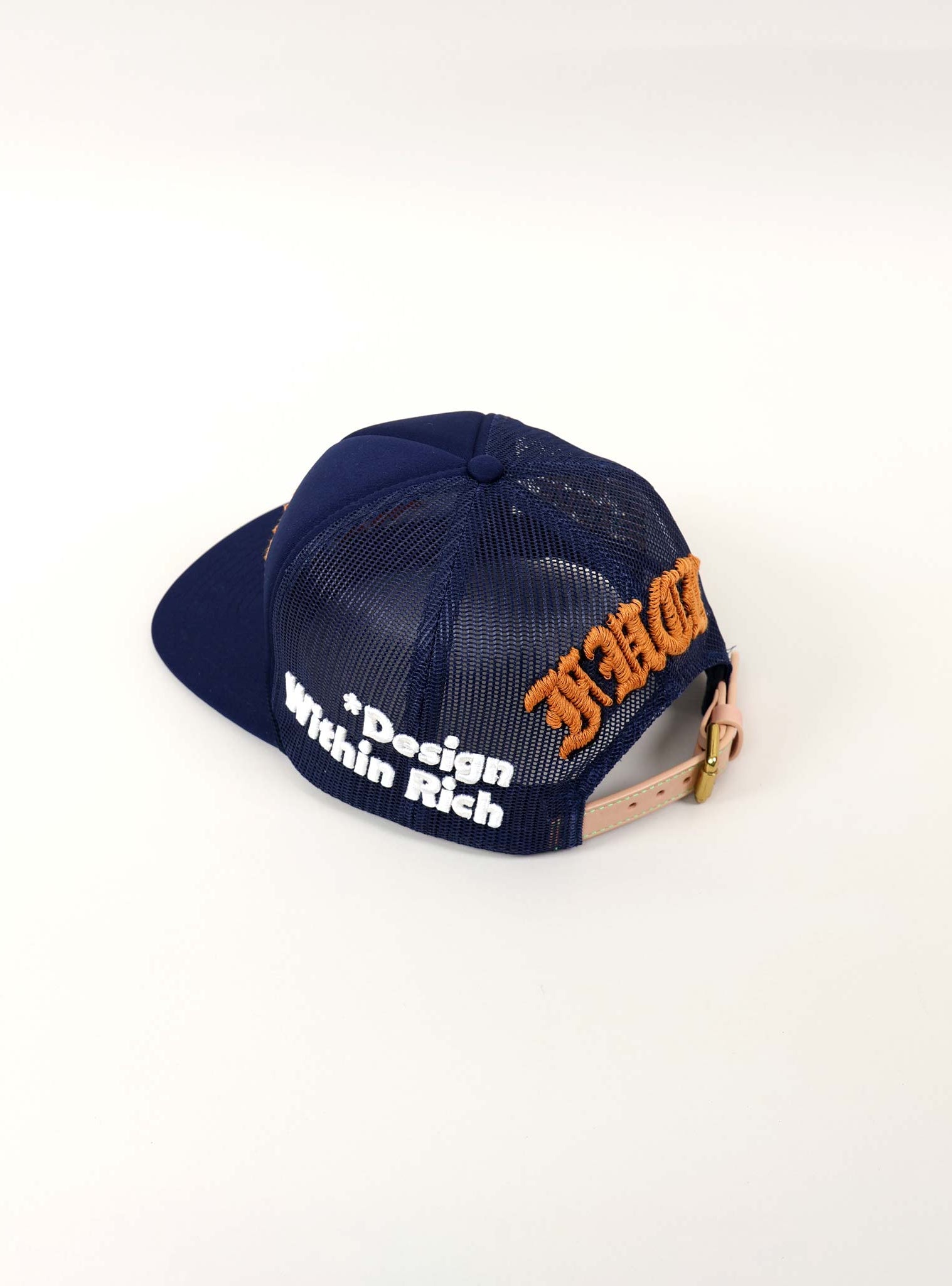 Blue mesh cap with orange and white text.