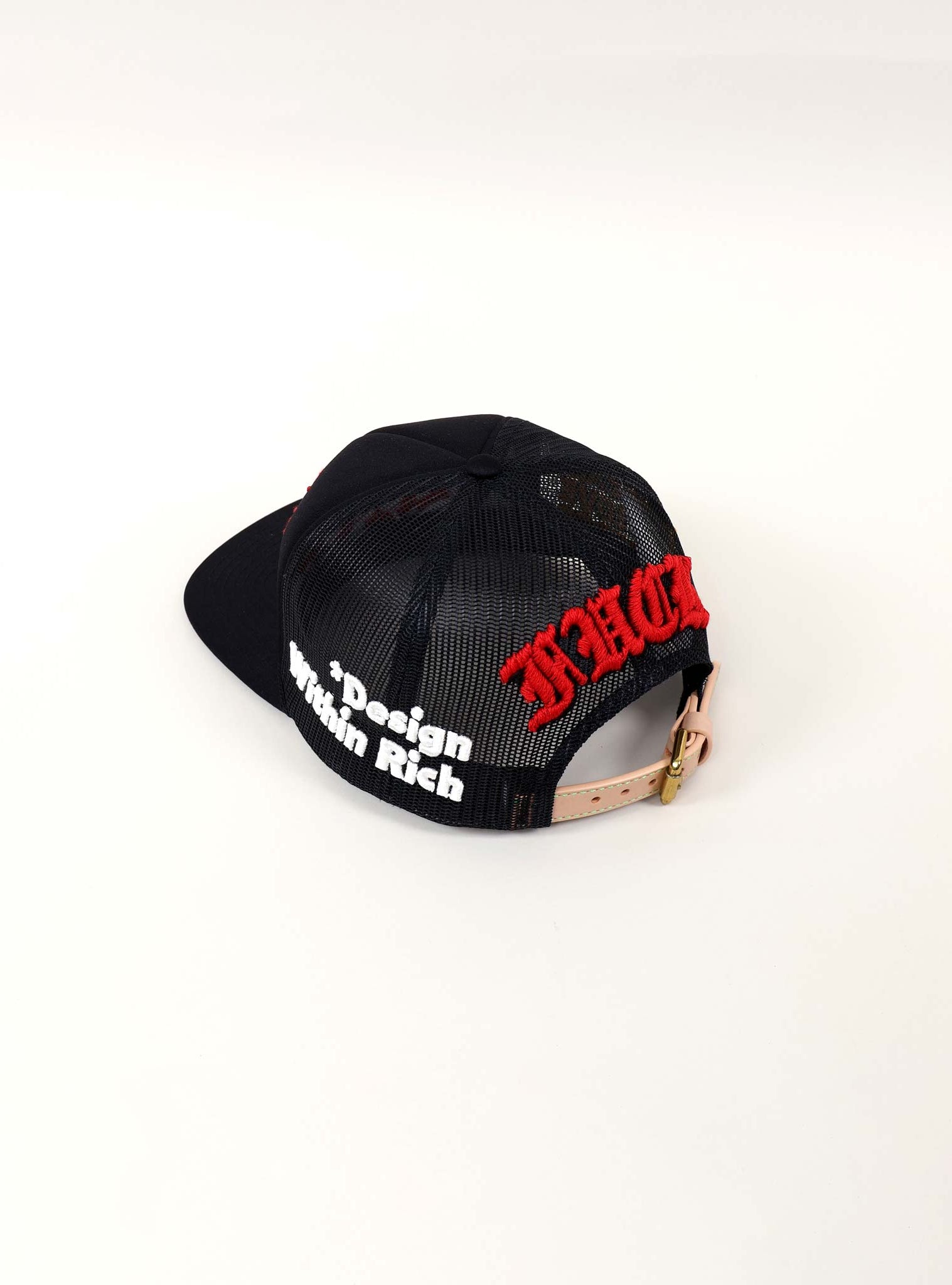 Black mesh cap with red and white text.