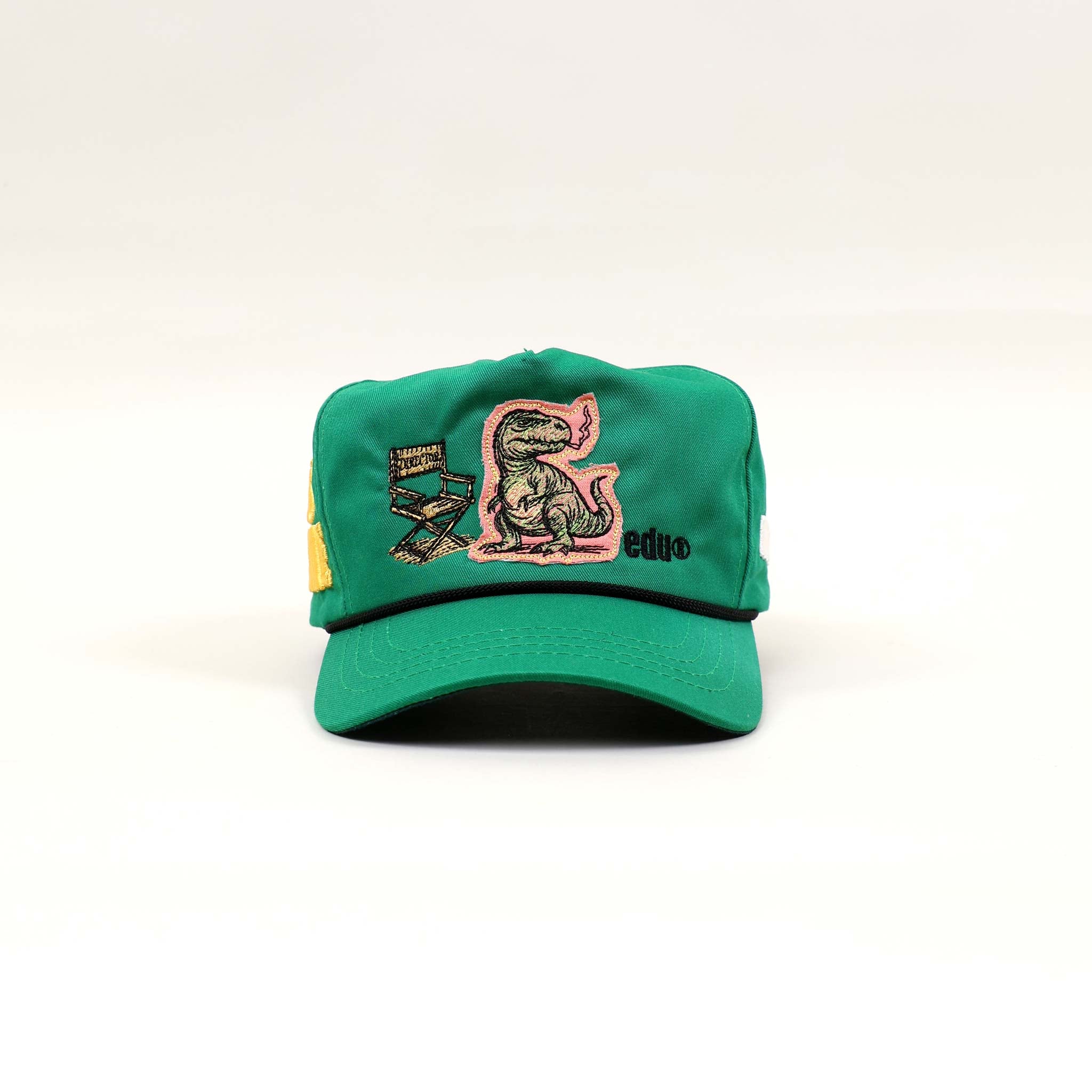 Green cap with dinosaur and text design.