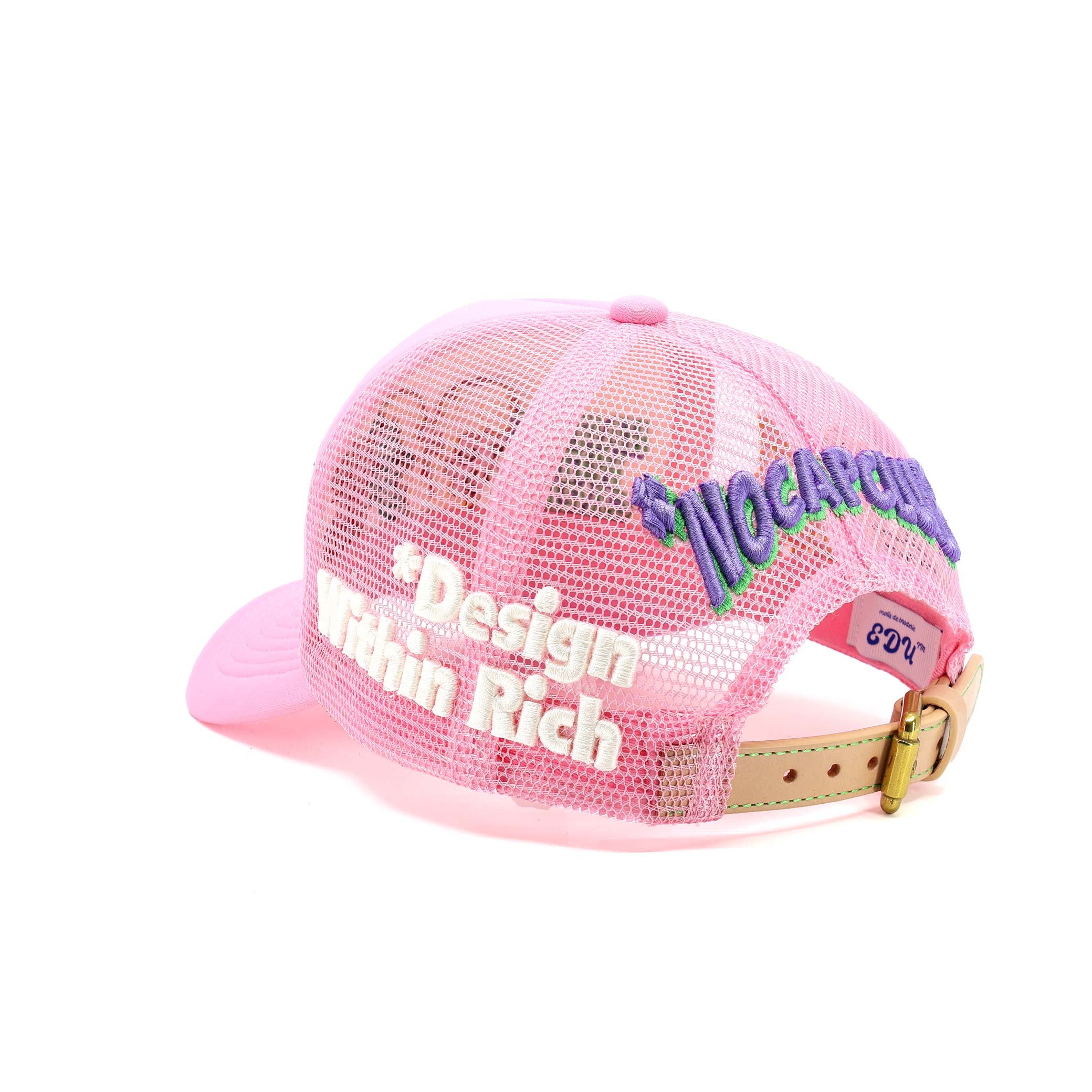 Pink mesh cap with decorative elements on a white background