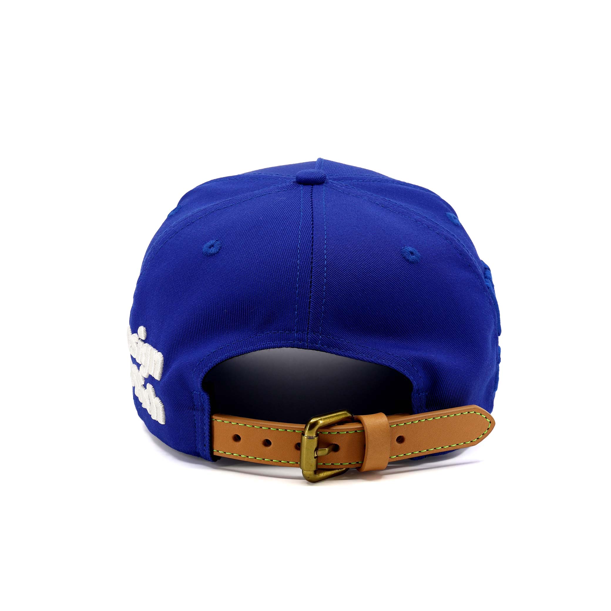 Blue cap with a brown strap and gold buckle on a white background