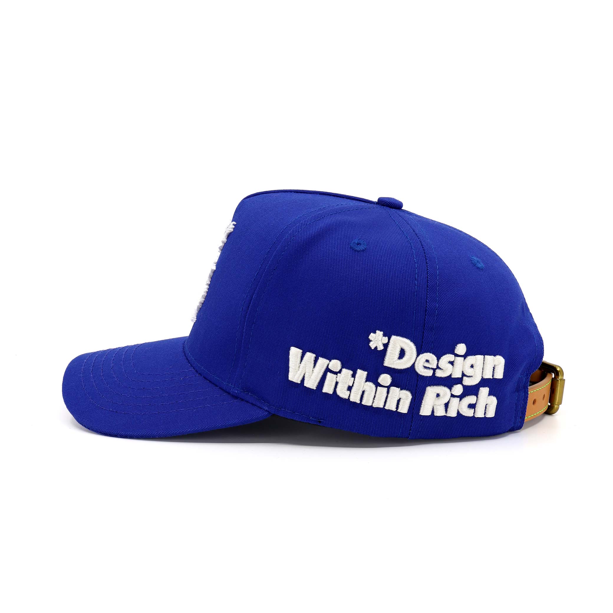 Blue cap with 'Design Within Rich' text on a white background