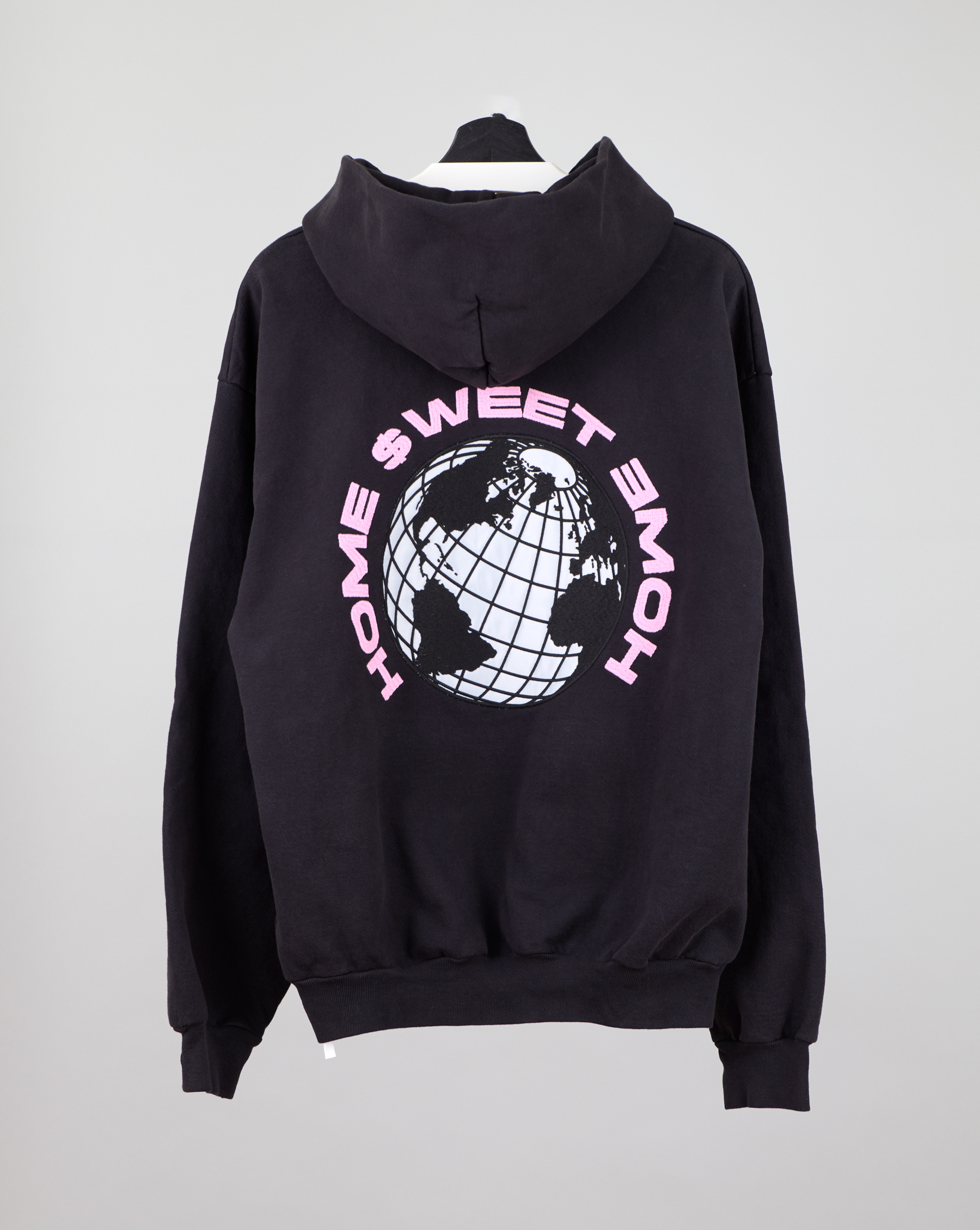 Black hoodie with globe and "Home Sweet Home" text.