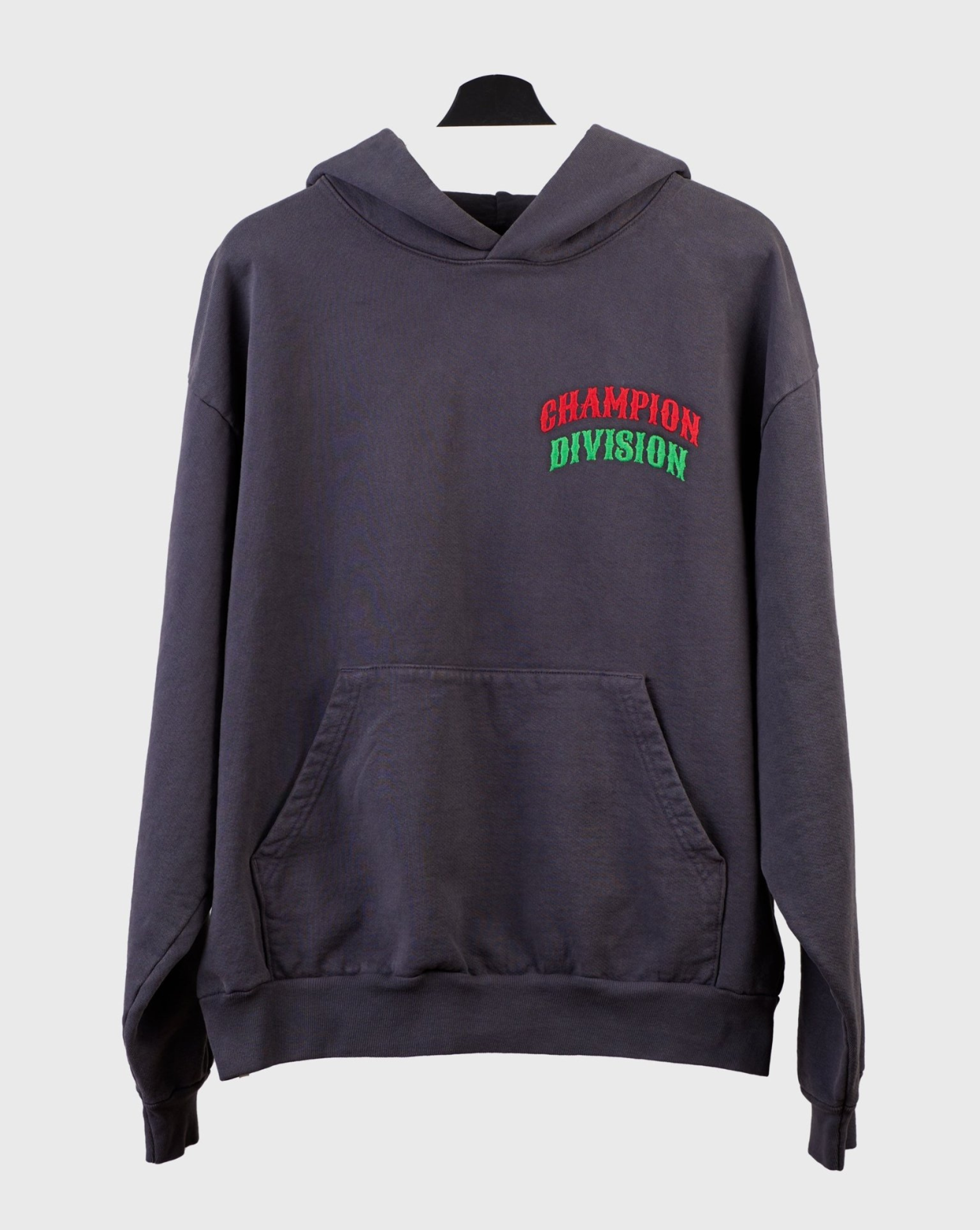 Gray hoodie with "Champion Division" text.