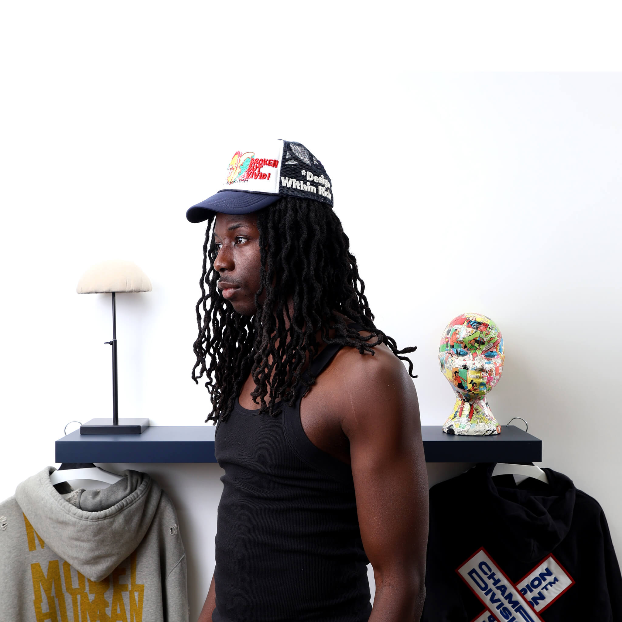 Broken Black Trucker Hat worn by male model -Side View