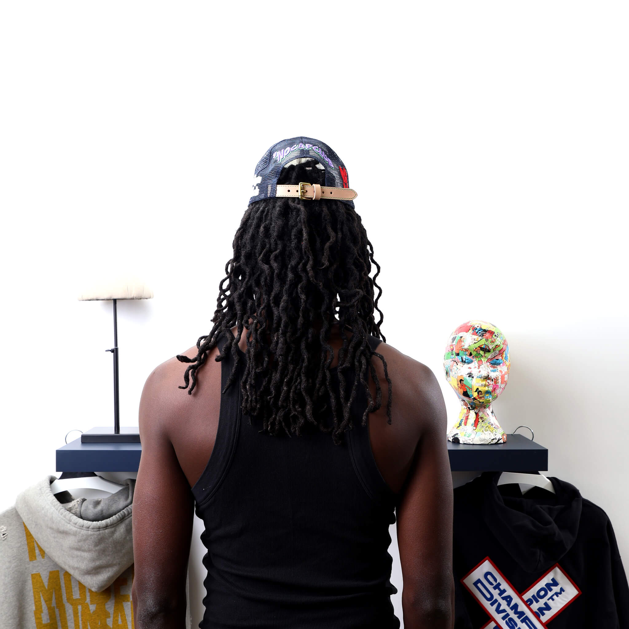 Broken Black Trucker Hat worn by male model -Back View