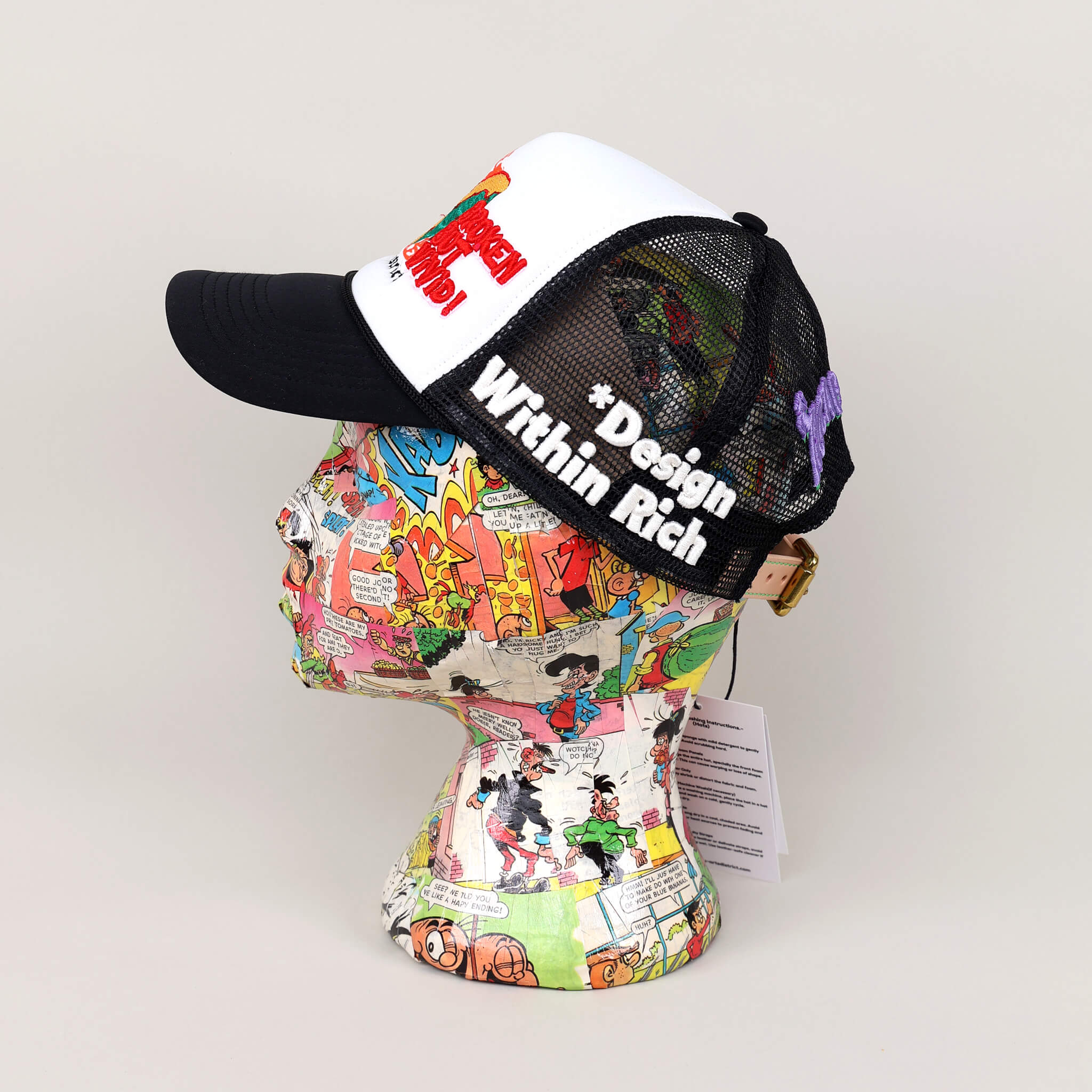 Broken Navy Trucker Hat on Mannequin - Left View