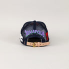 Navy mesh cap with "NOCAPCLUB" text, tan strap.