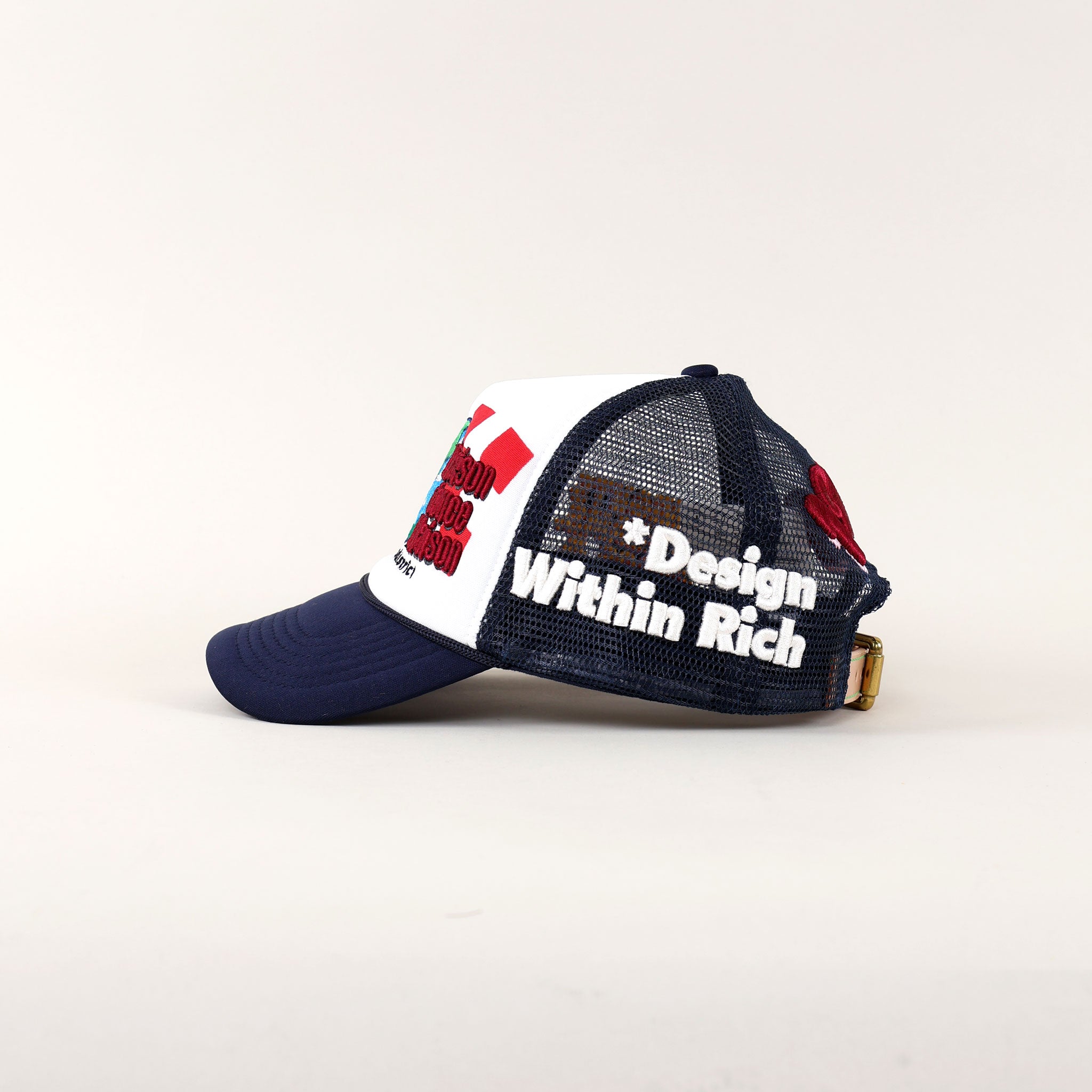 Blue and white mesh cap with text design.