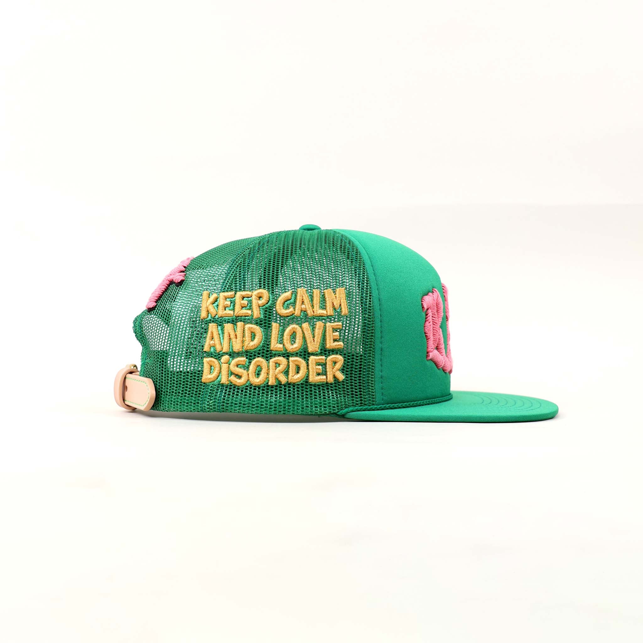 Green cap with "Keep Calm and Love Disorder" text.	