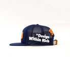 Blue mesh cap with "Design Within Rich" text.
